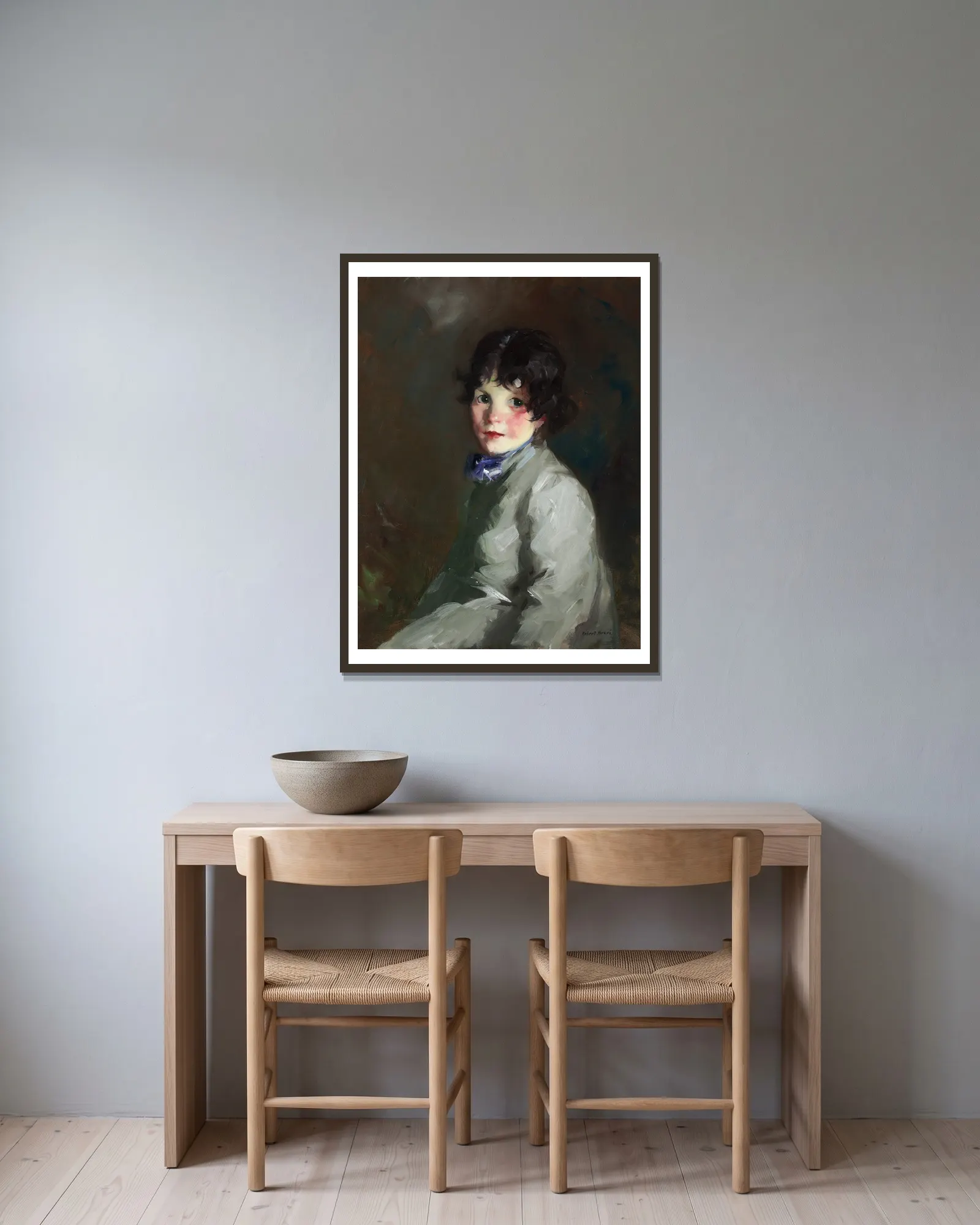 Catharine av Robert Henri inramad på en vägg