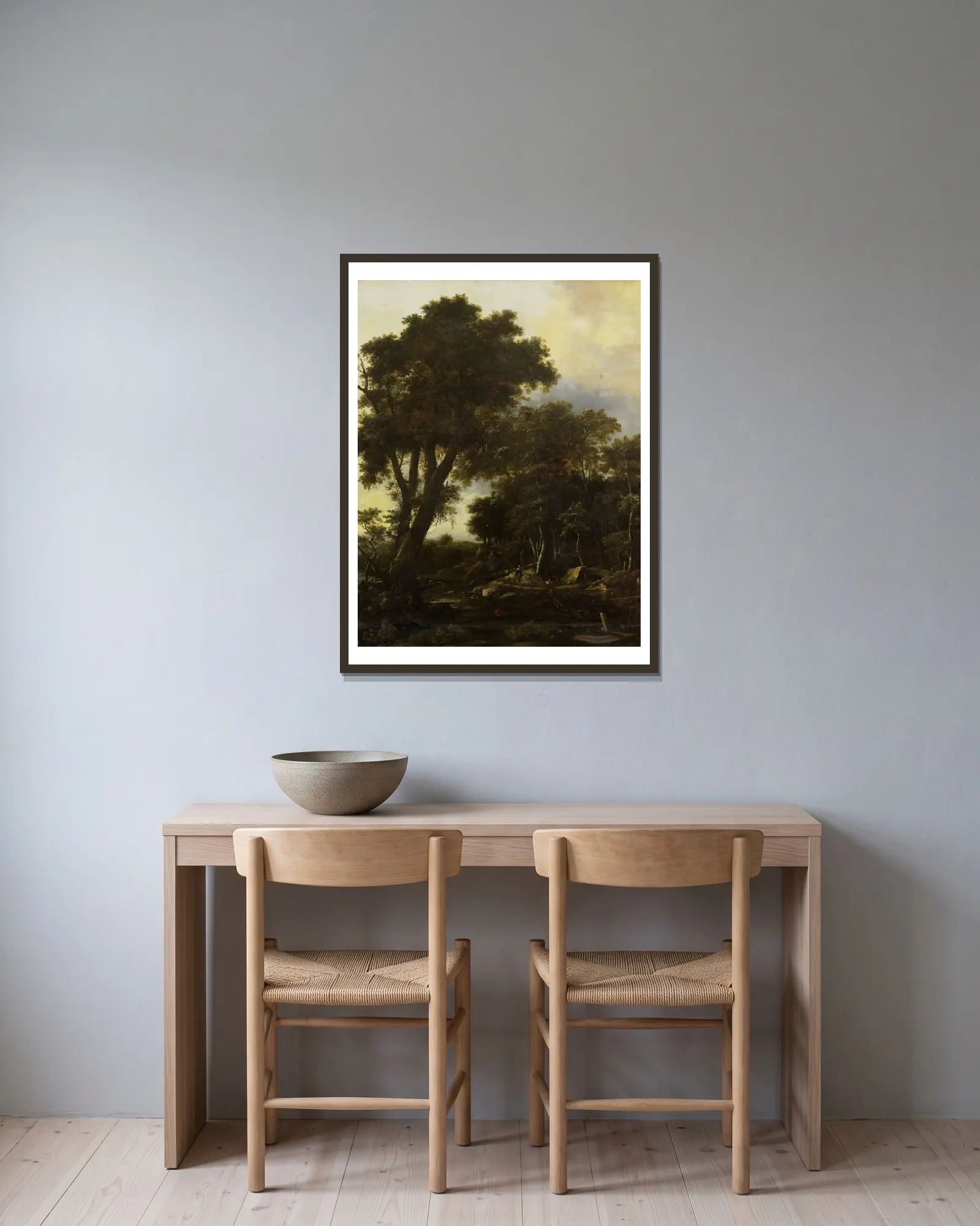 Forest landscape with lean-to av Roelant Roghman inramad på en vägg