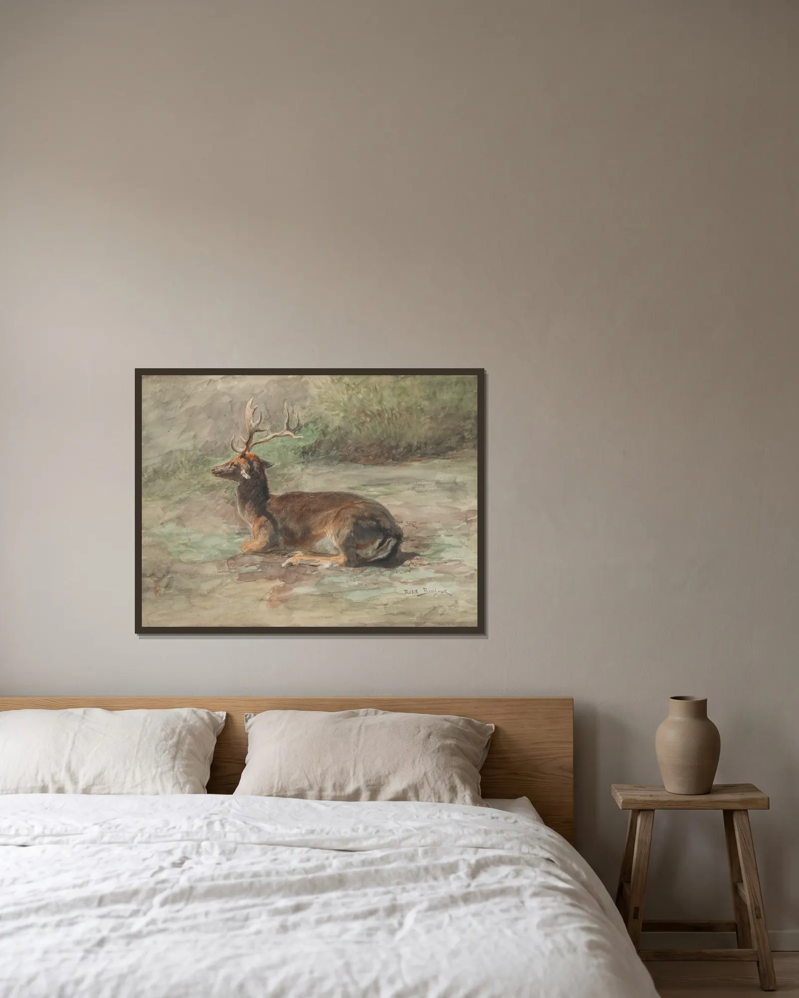 Stag Lying Down av Rosa Bonheur inramad på en vägg