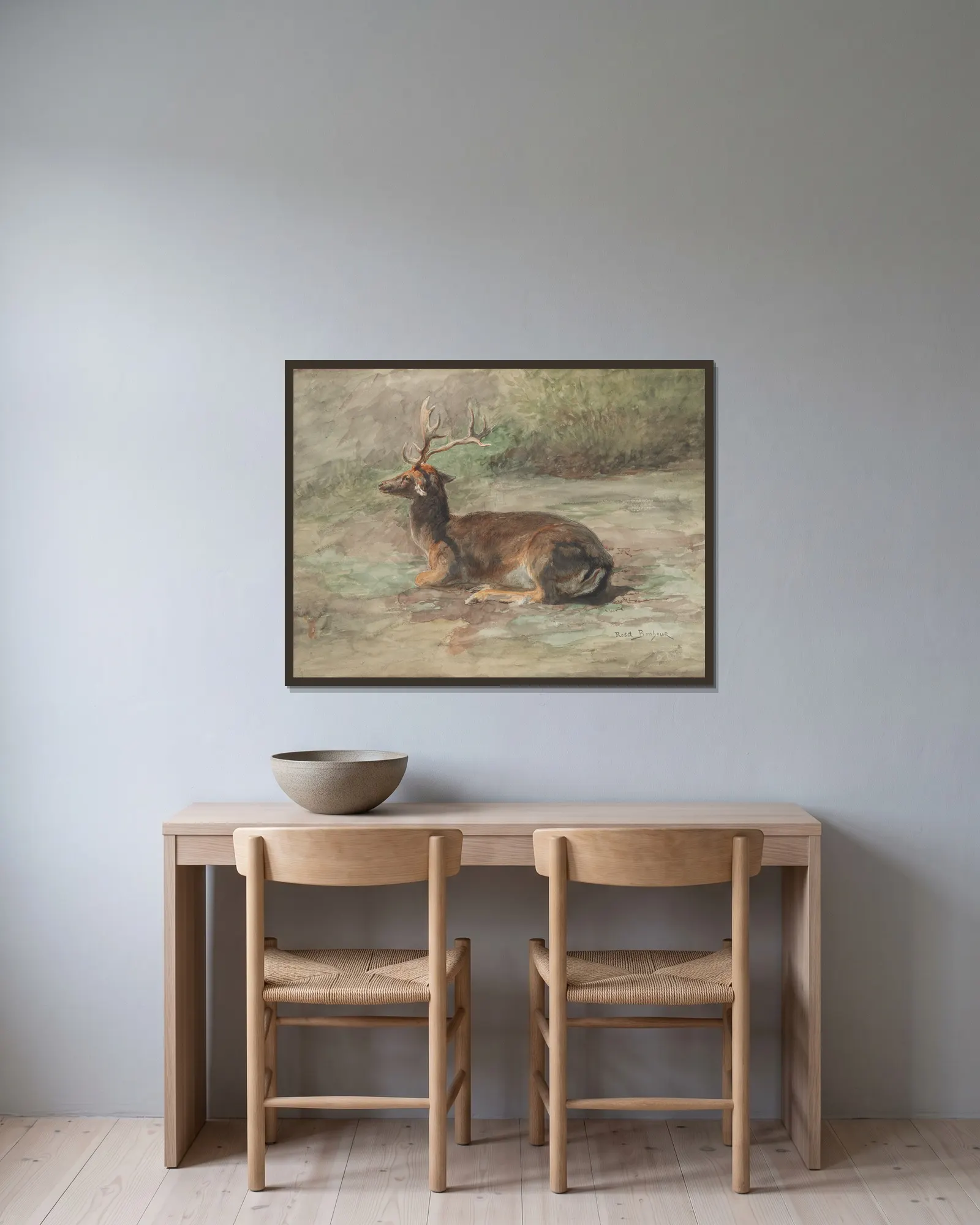 Stag Lying Down av Rosa Bonheur inramad på en vägg