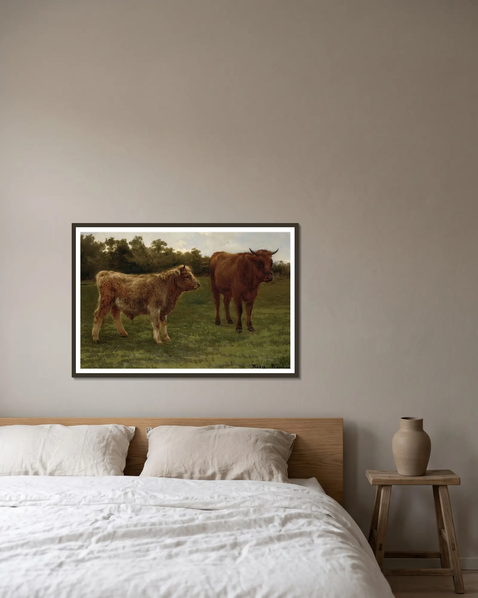 Two Cows Grazing av Rosa Bonheur inramad på en vägg