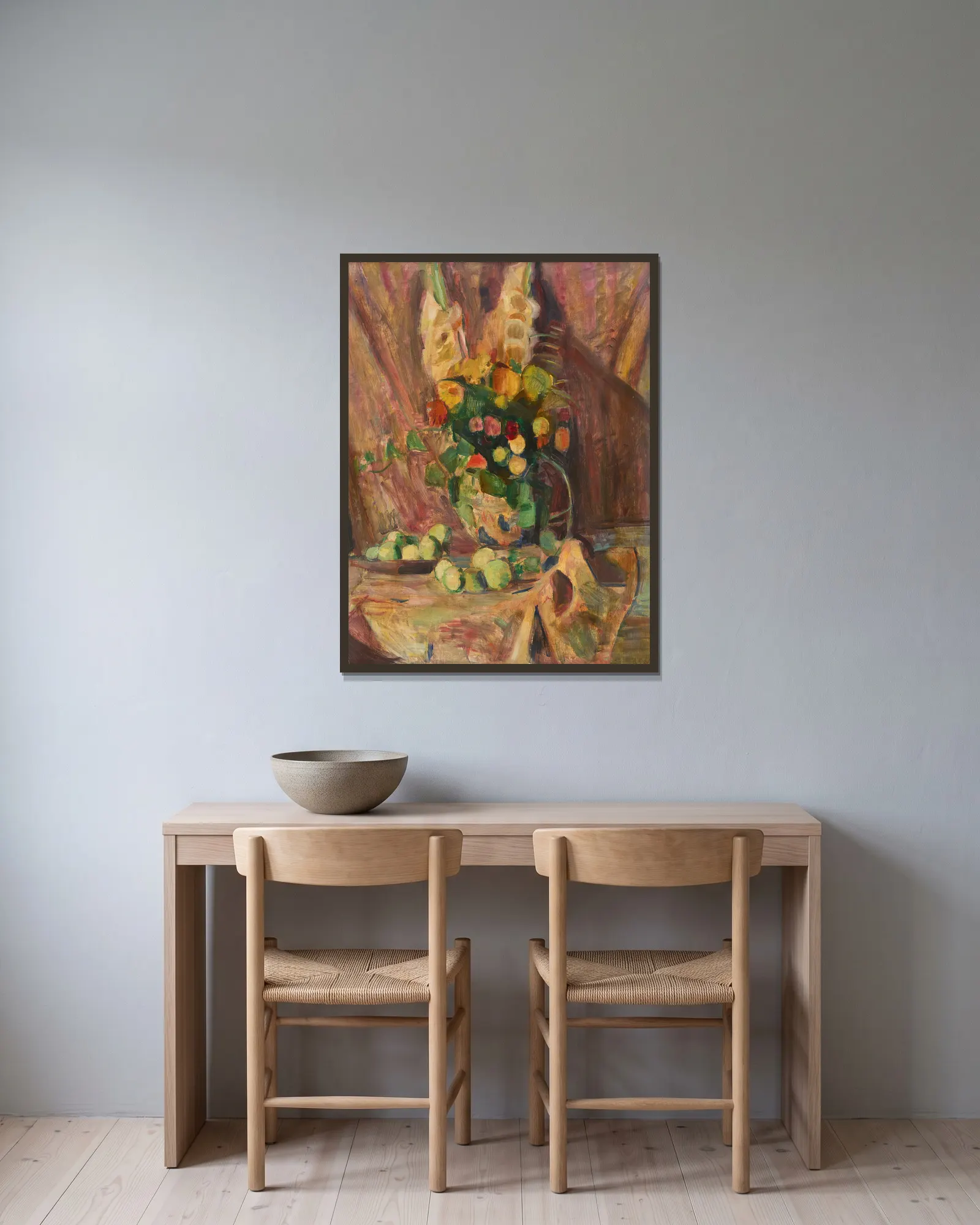 Blumenstilleben av Rudolf Grossmann inramad på en vägg