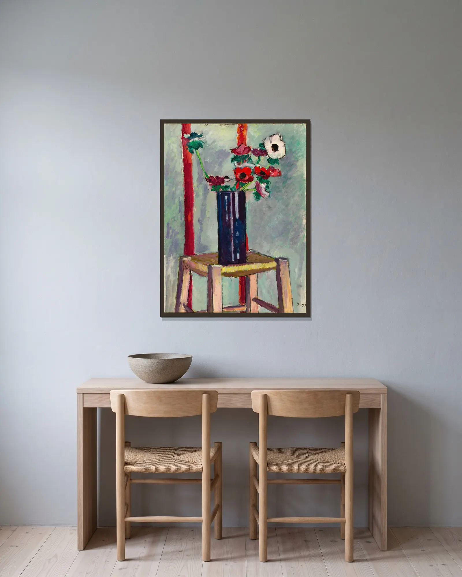 Anemones av Henry Lyman Saÿen inramad på en vägg