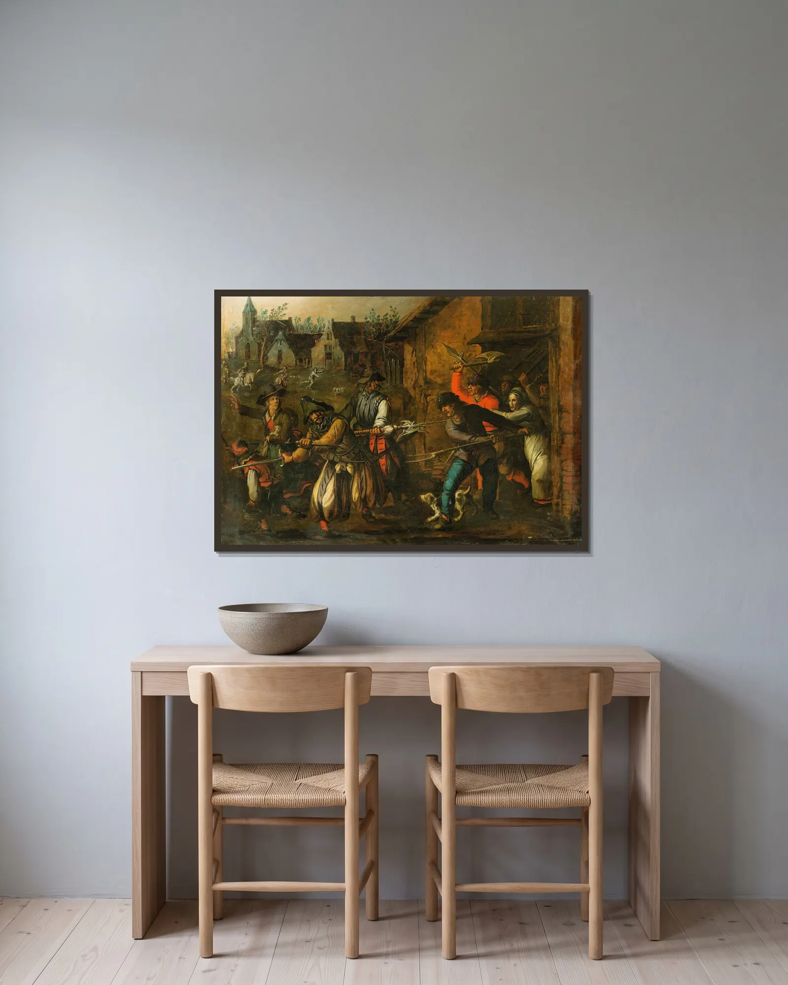 Pillage scene av Sebastian Vrancx inramad på en vägg