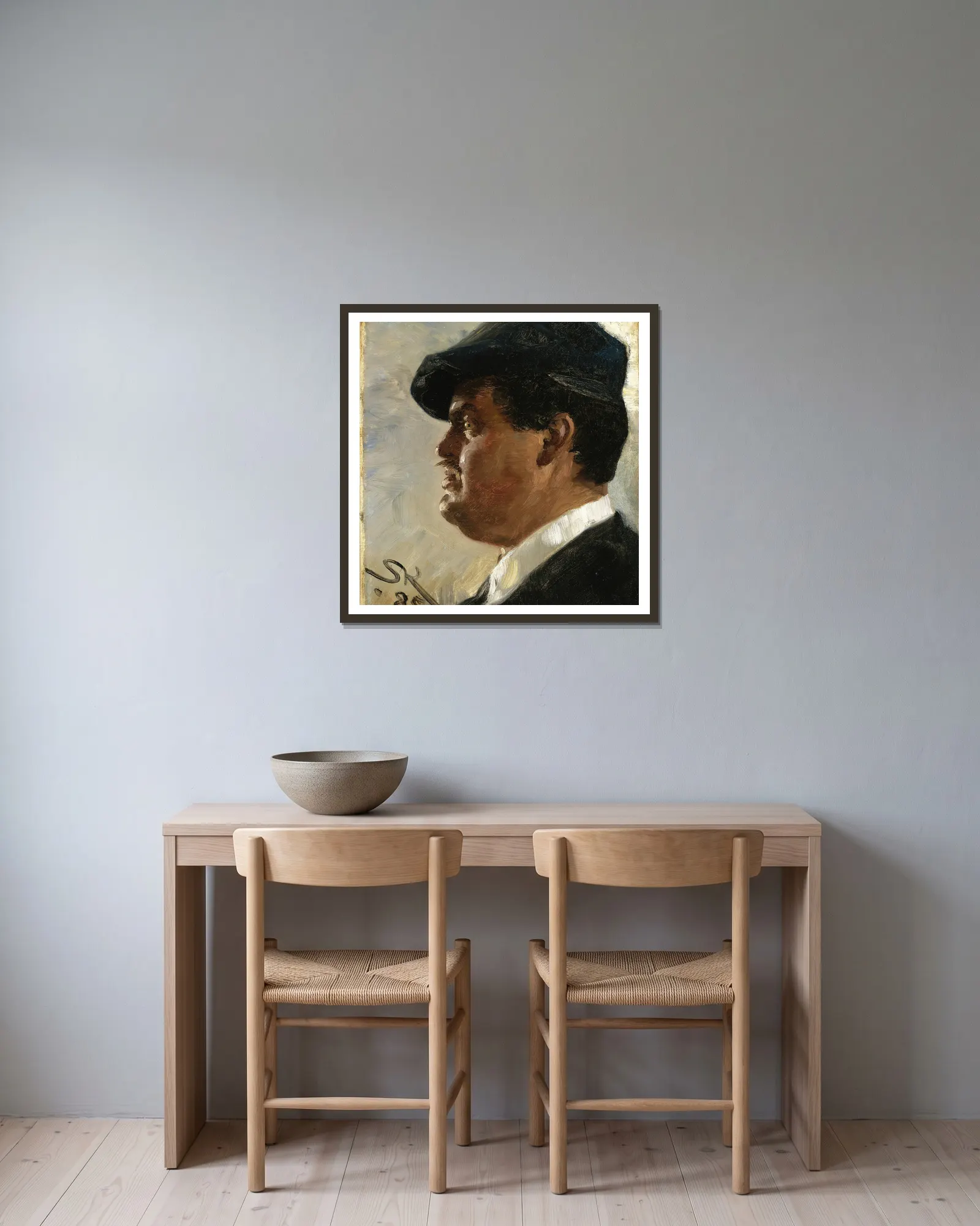 Carl Locher av Peder Severin Krøyer inramad på en vägg