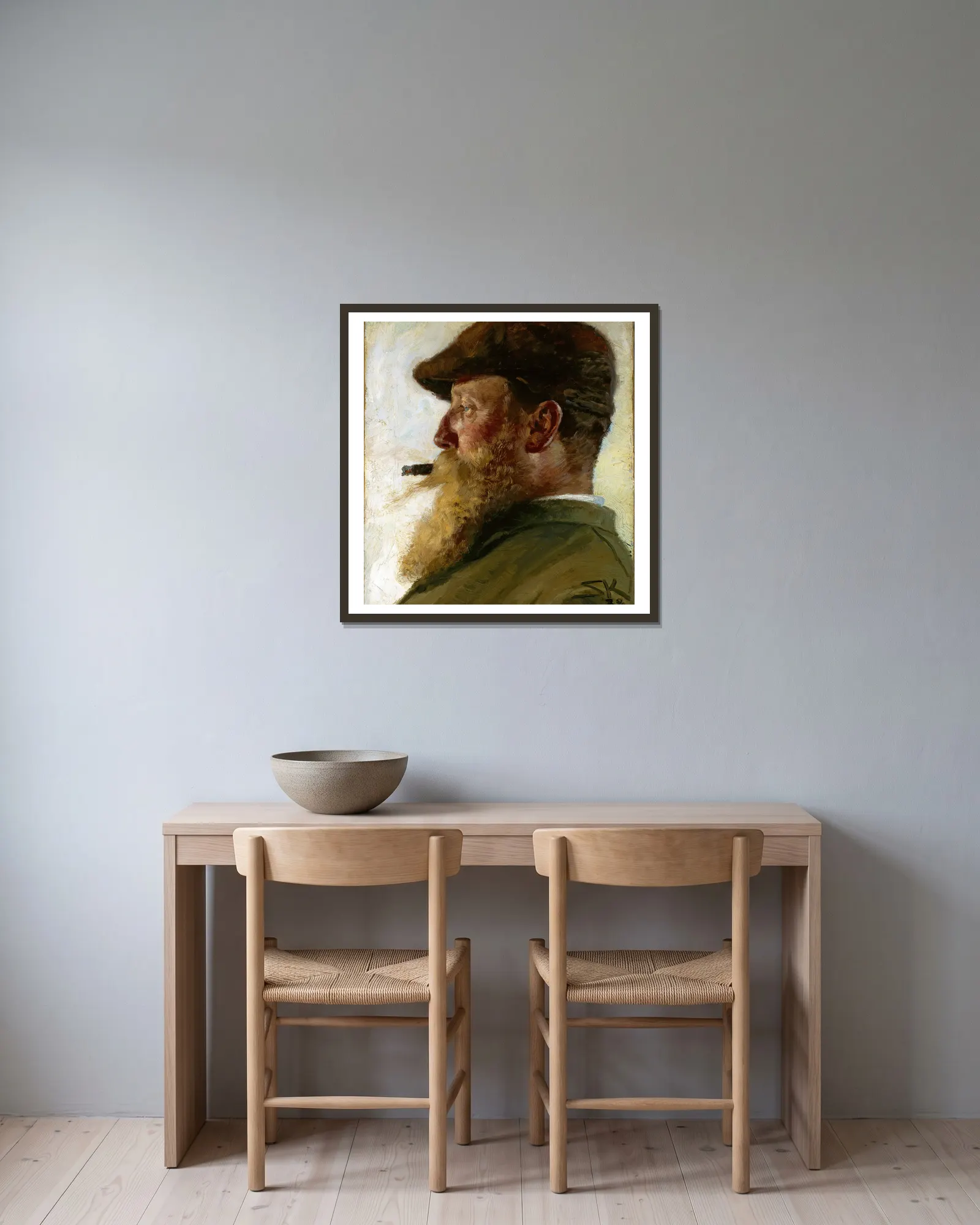 Christian Krohg av Peder Severin Krøyer inramad på en vägg