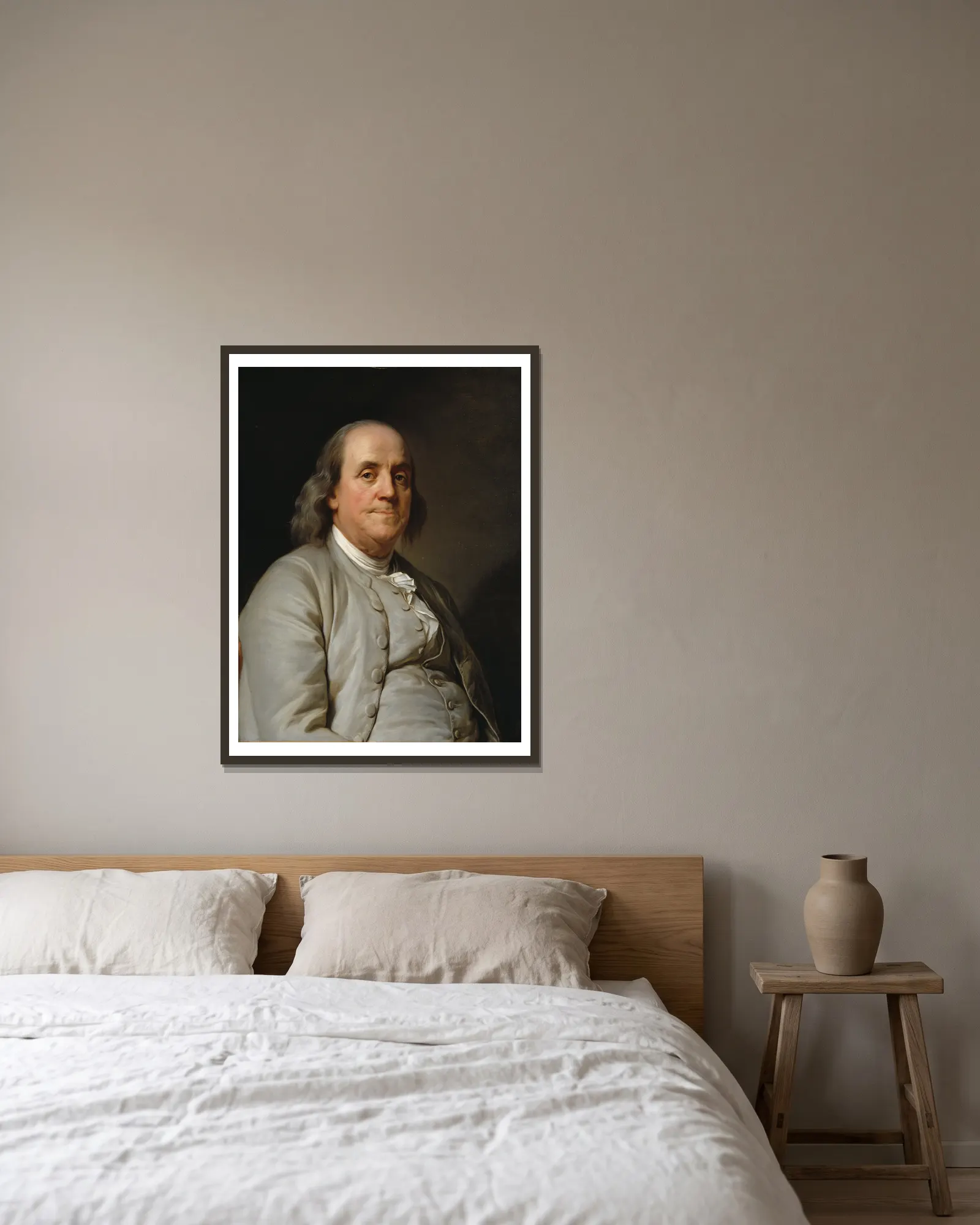 Benjamin Franklin av Joseph Siffred Duplessis inramad på en vägg