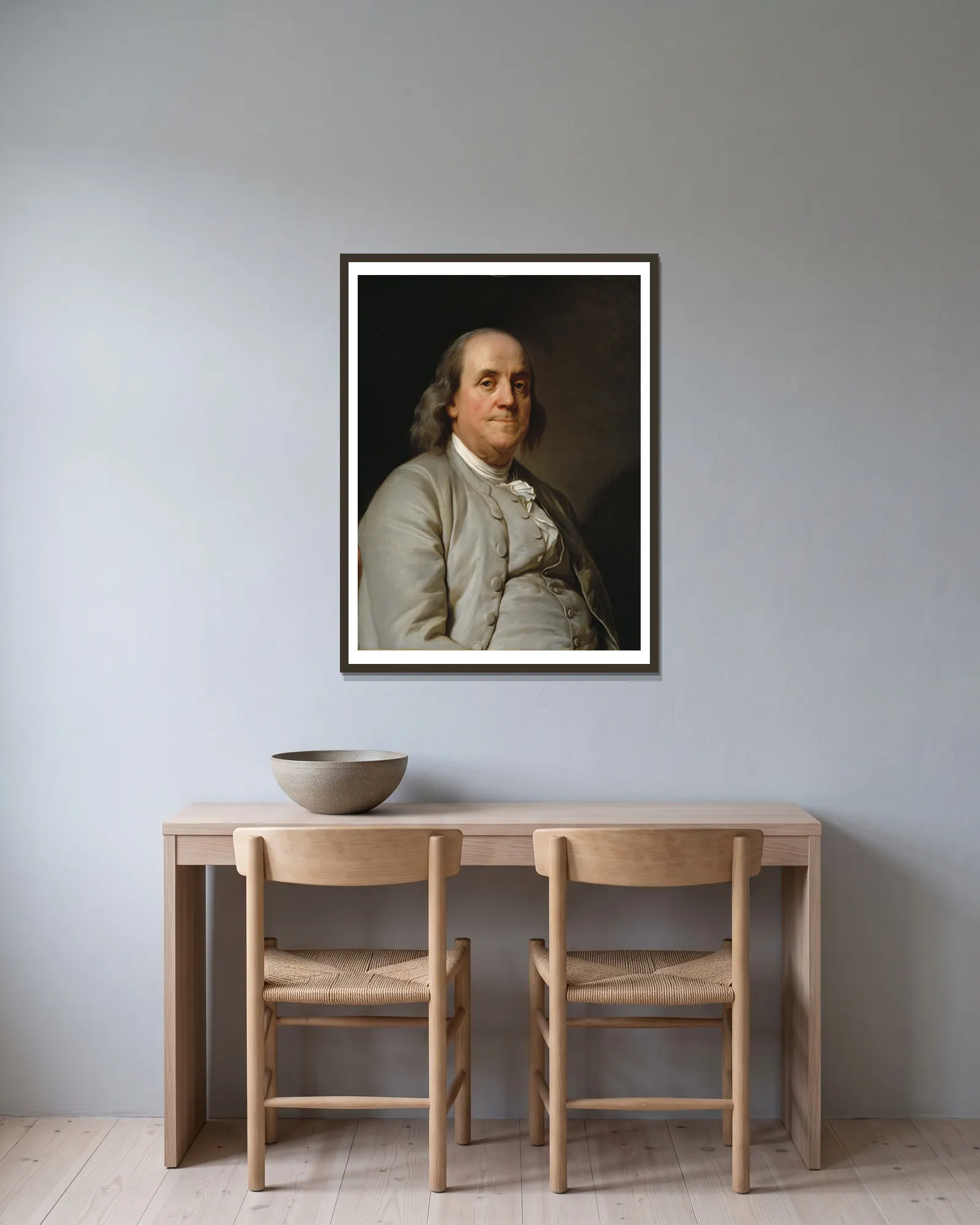 Benjamin Franklin av Joseph Siffred Duplessis inramad på en vägg