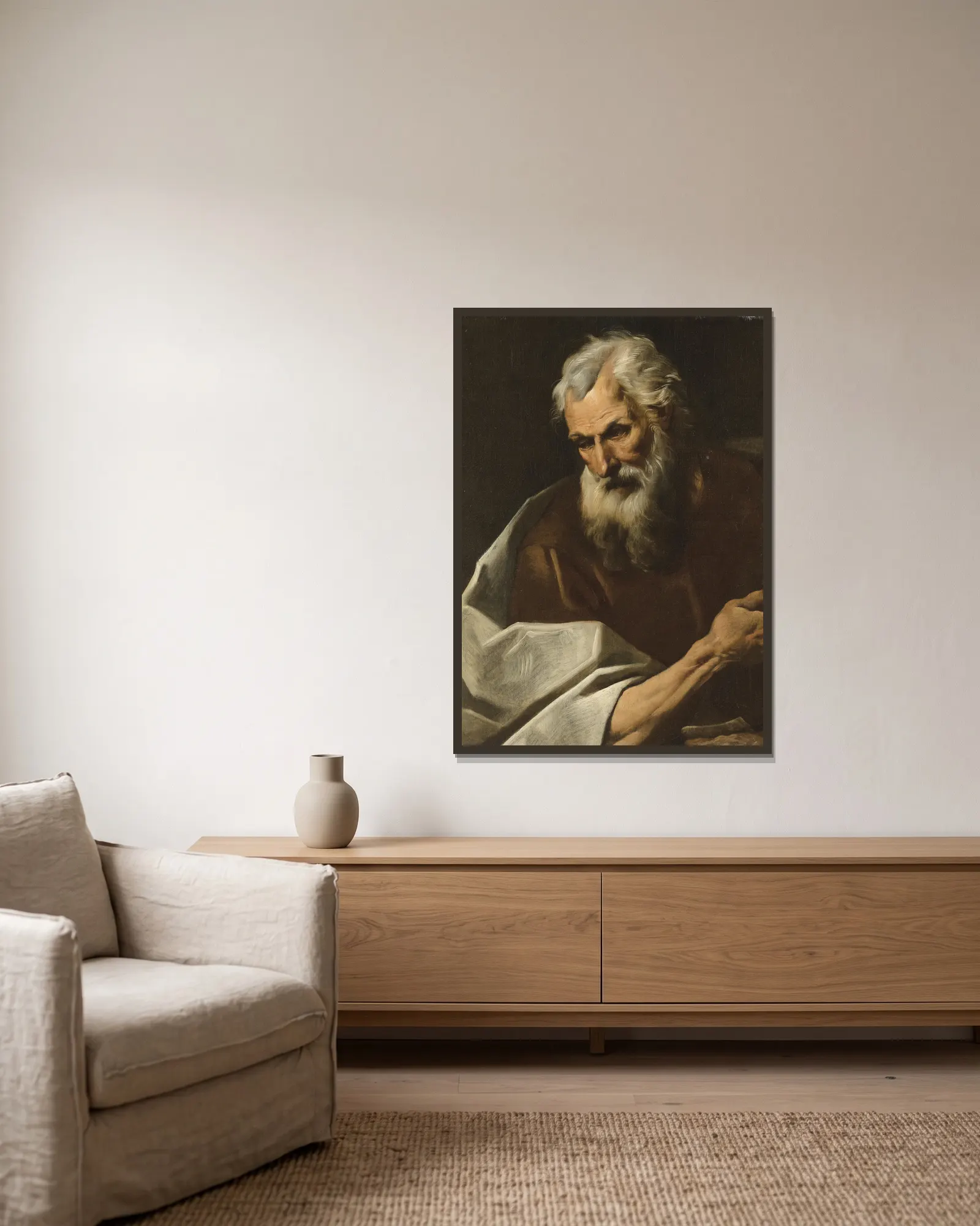 Une figure de saint av Simone Cantarini inramad på en vägg