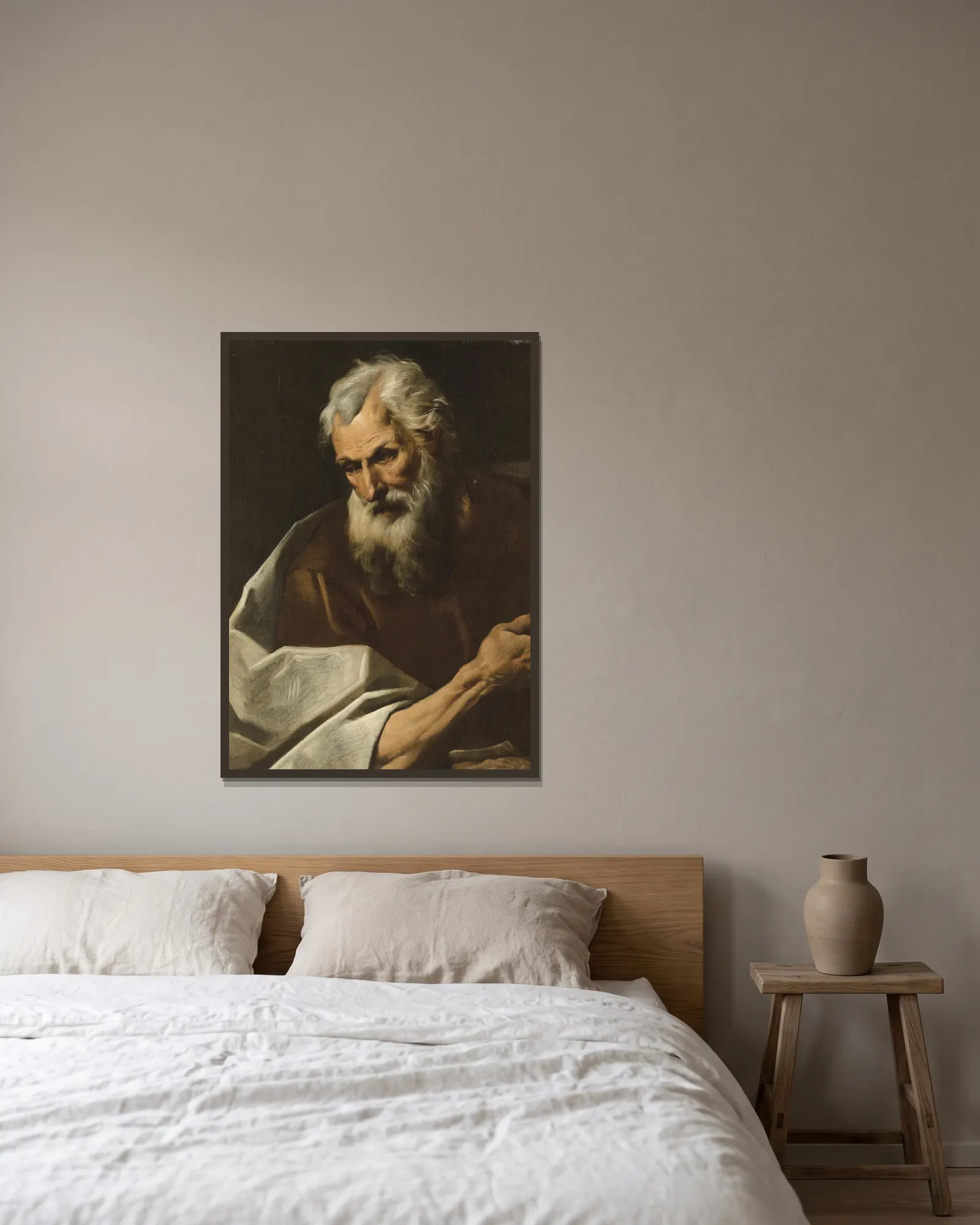 Une figure de saint av Simone Cantarini inramad på en vägg