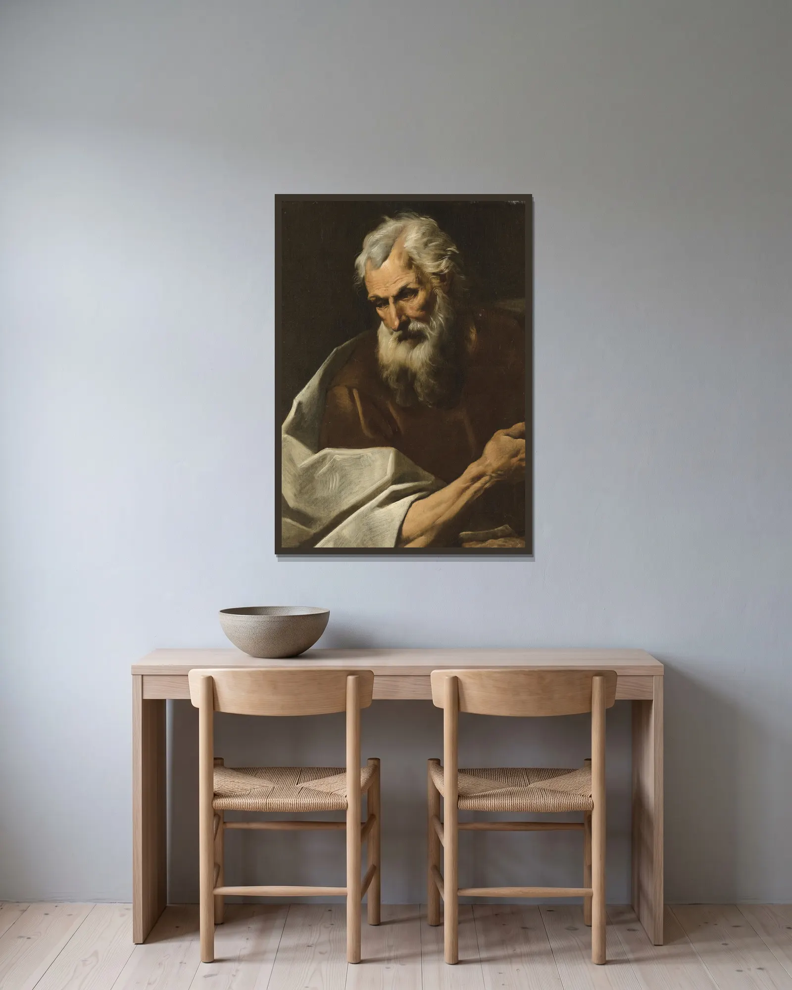 Une figure de saint av Simone Cantarini inramad på en vägg