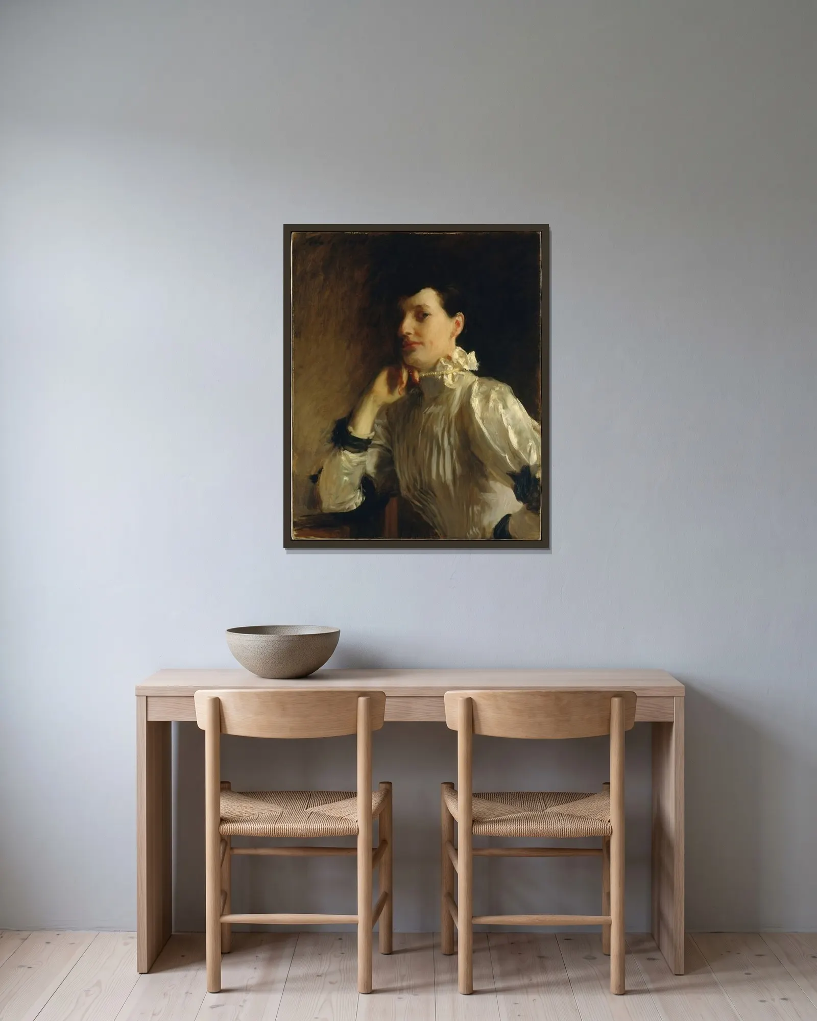 Mrs. Henry Galbraith Ward av John Singer Sargent inramad på en vägg