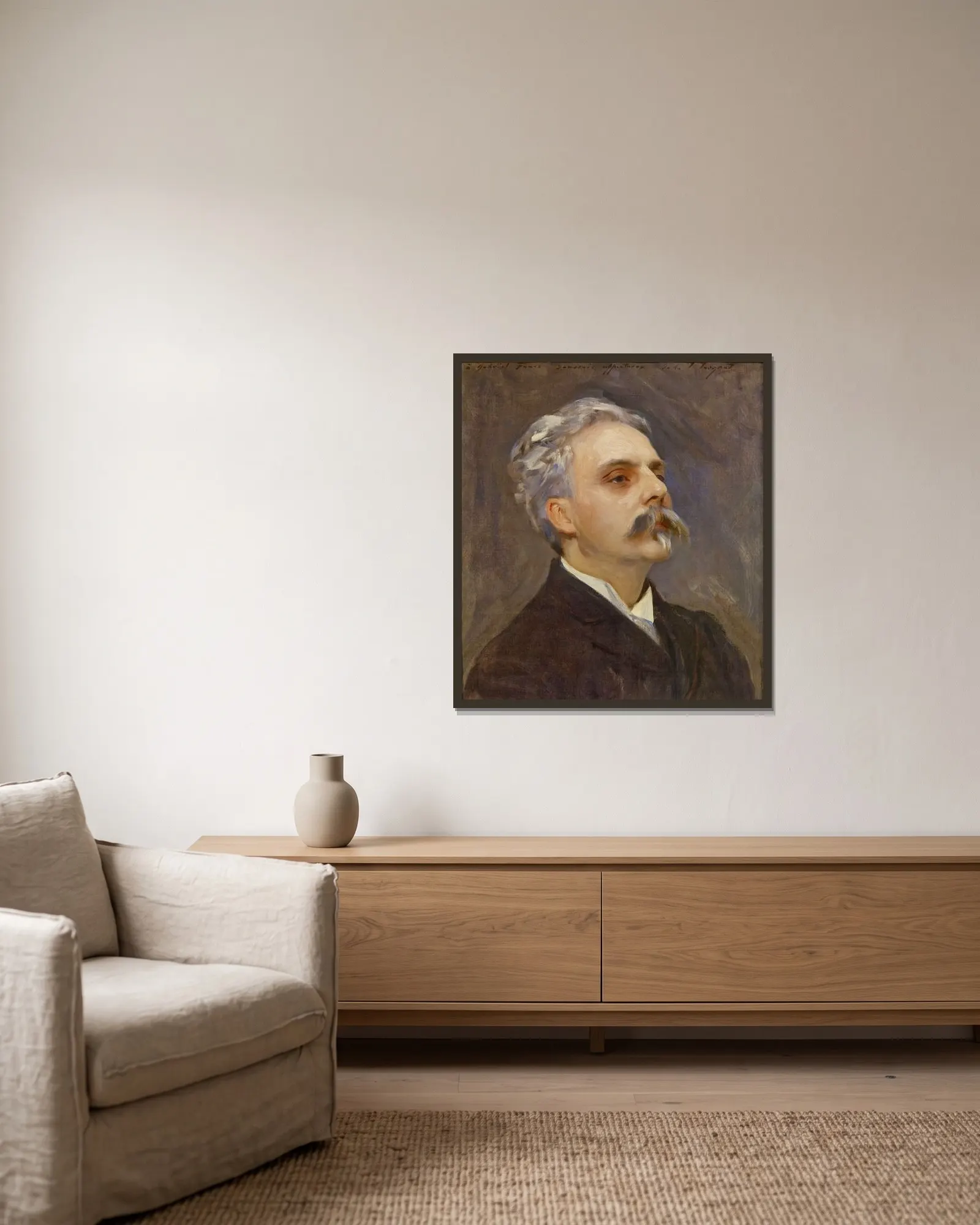 Portrait de Gabriel Fauré av John Singer Sargent inramad på en vägg