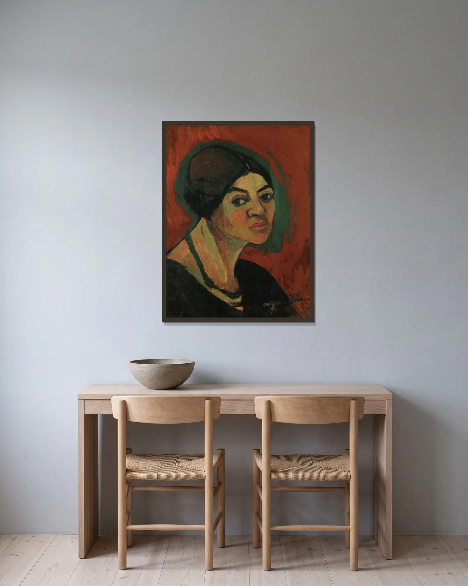 Autoportrait av Suzanne Valadon inramad på en vägg