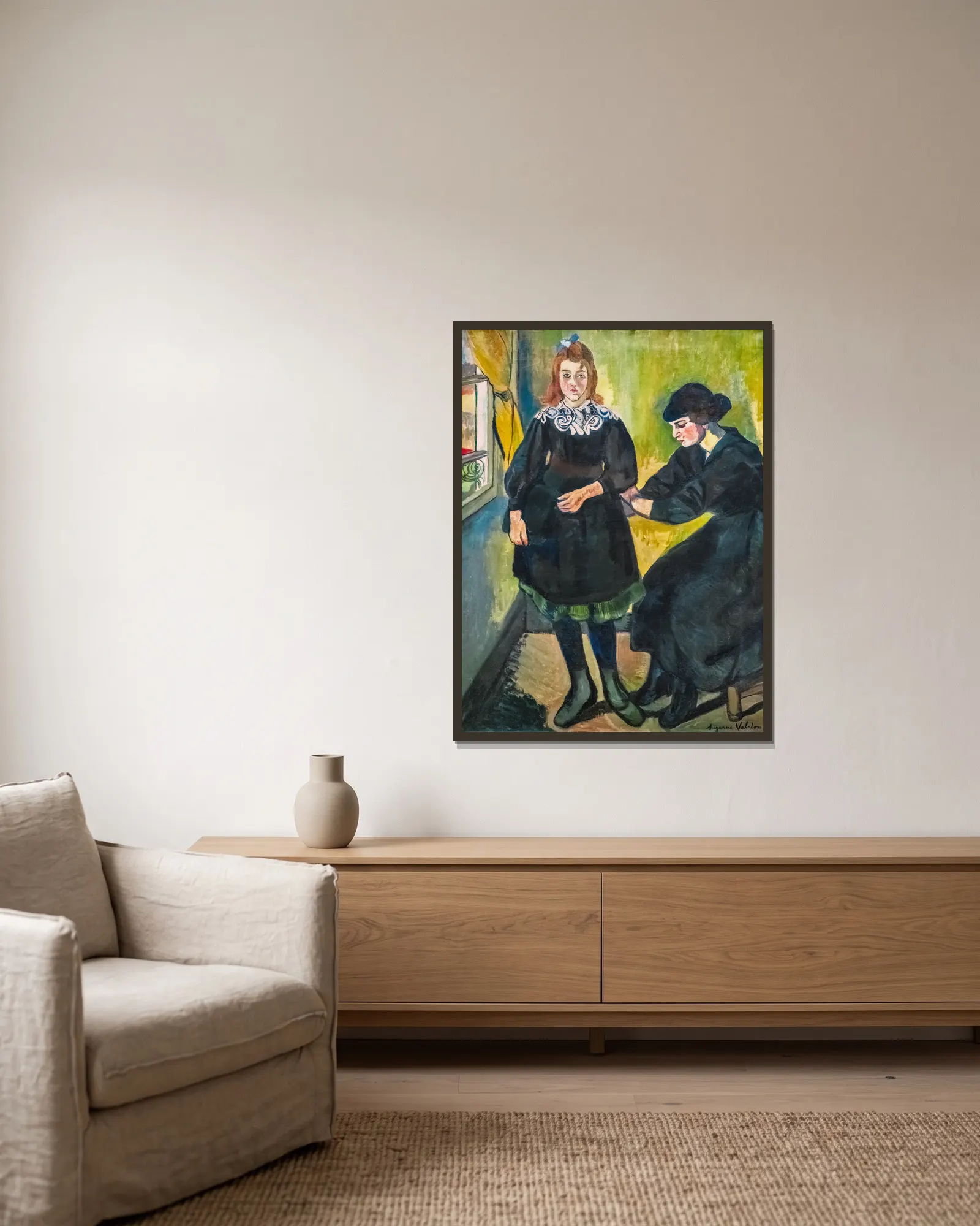 La couturière av Suzanne Valadon inramad på en vägg