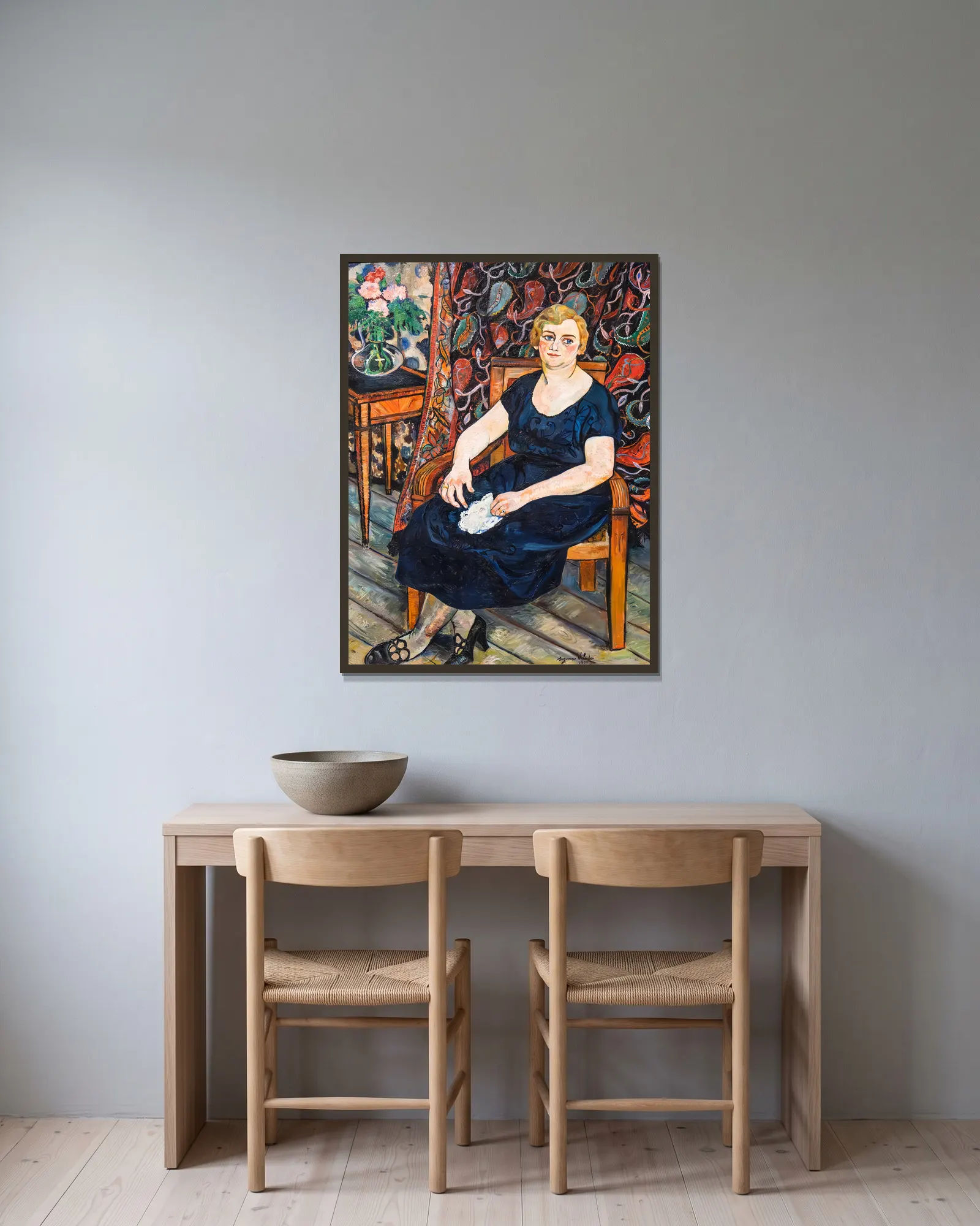Portrait de Madame Lévy av Suzanne Valadon inramad på en vägg