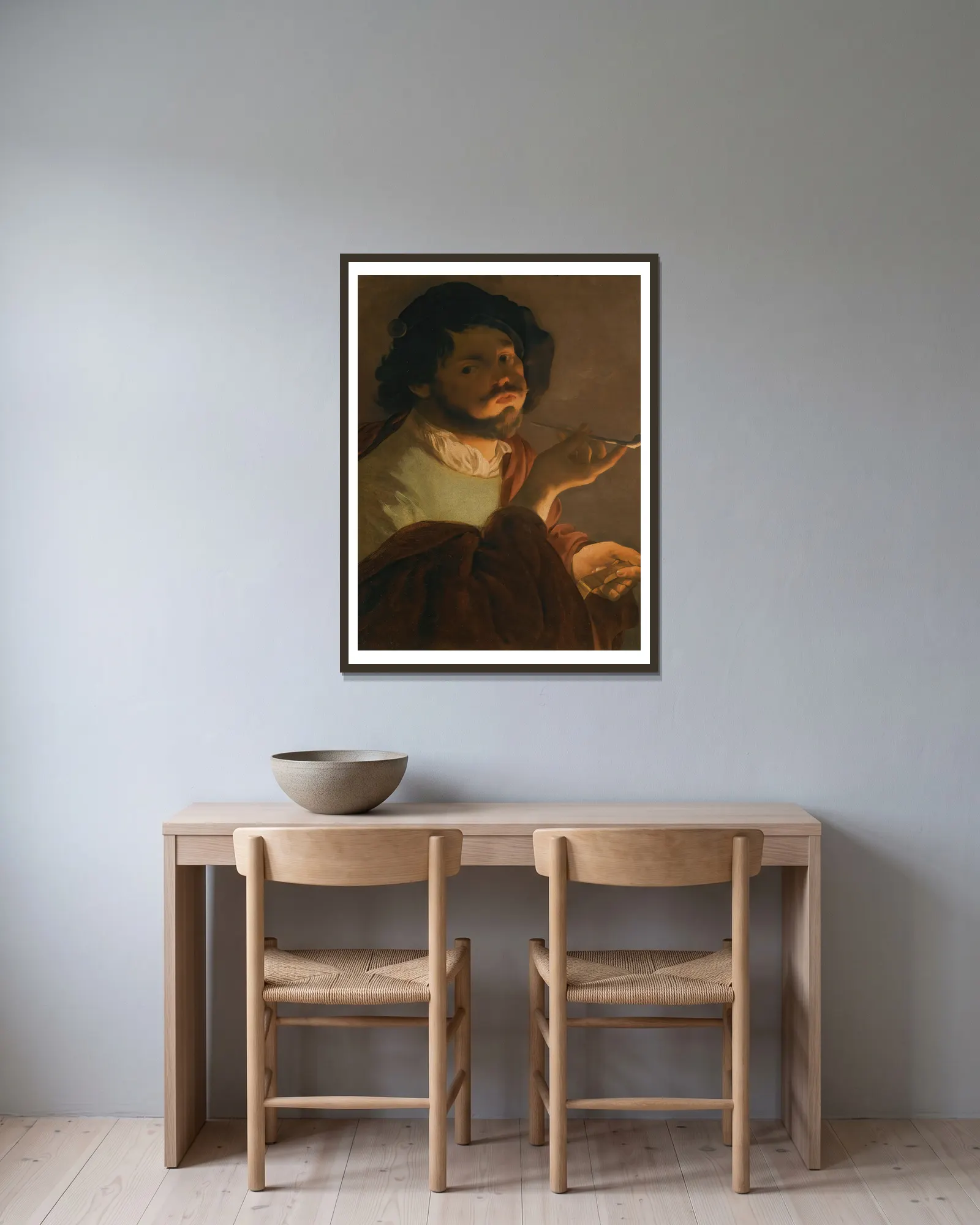 A Bravo Smoking av Hendrick Ter Brugghen inramad på en vägg