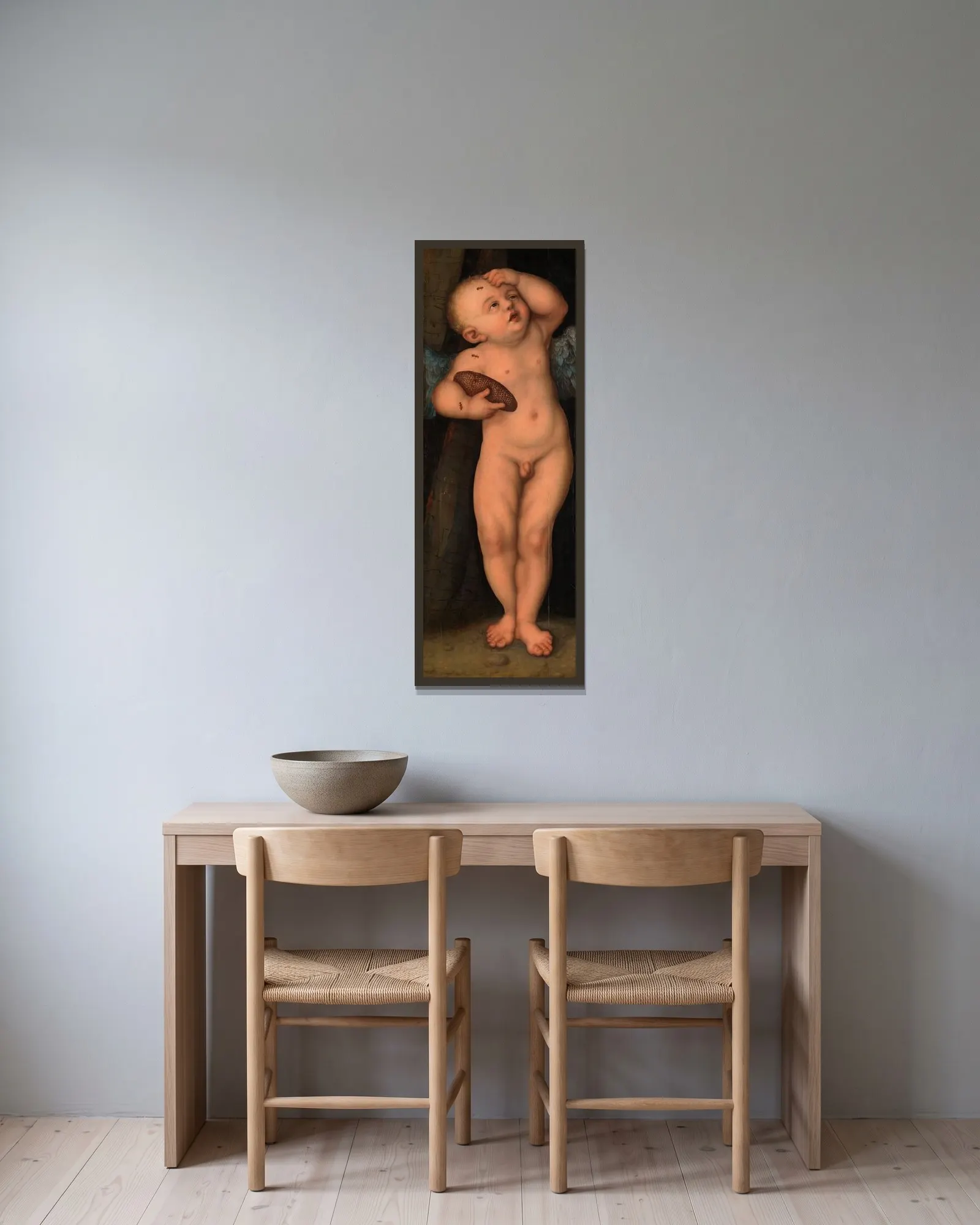 Amor als Honigdieb av Lucas Cranach the Elder inramad på en vägg