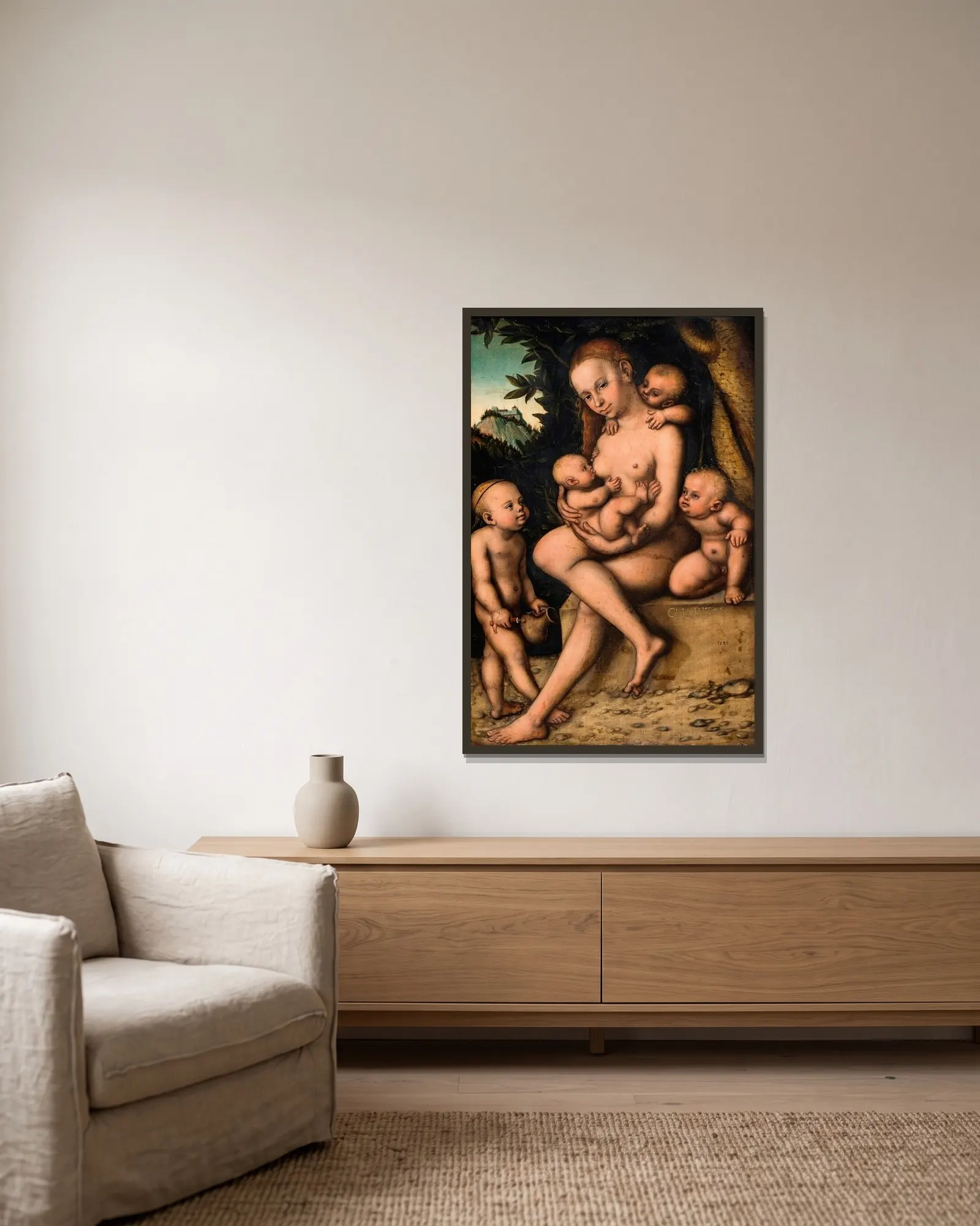 Caritas av Lucas Cranach the Elder inramad på en vägg