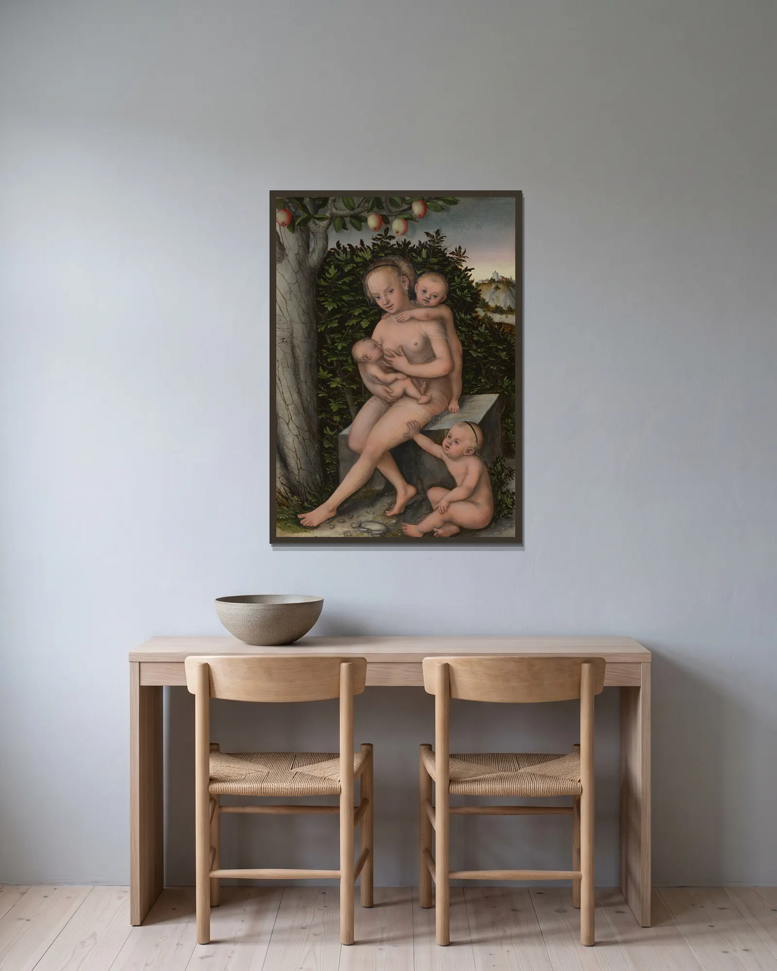 Charity av Lucas Cranach the Elder inramad på en vägg