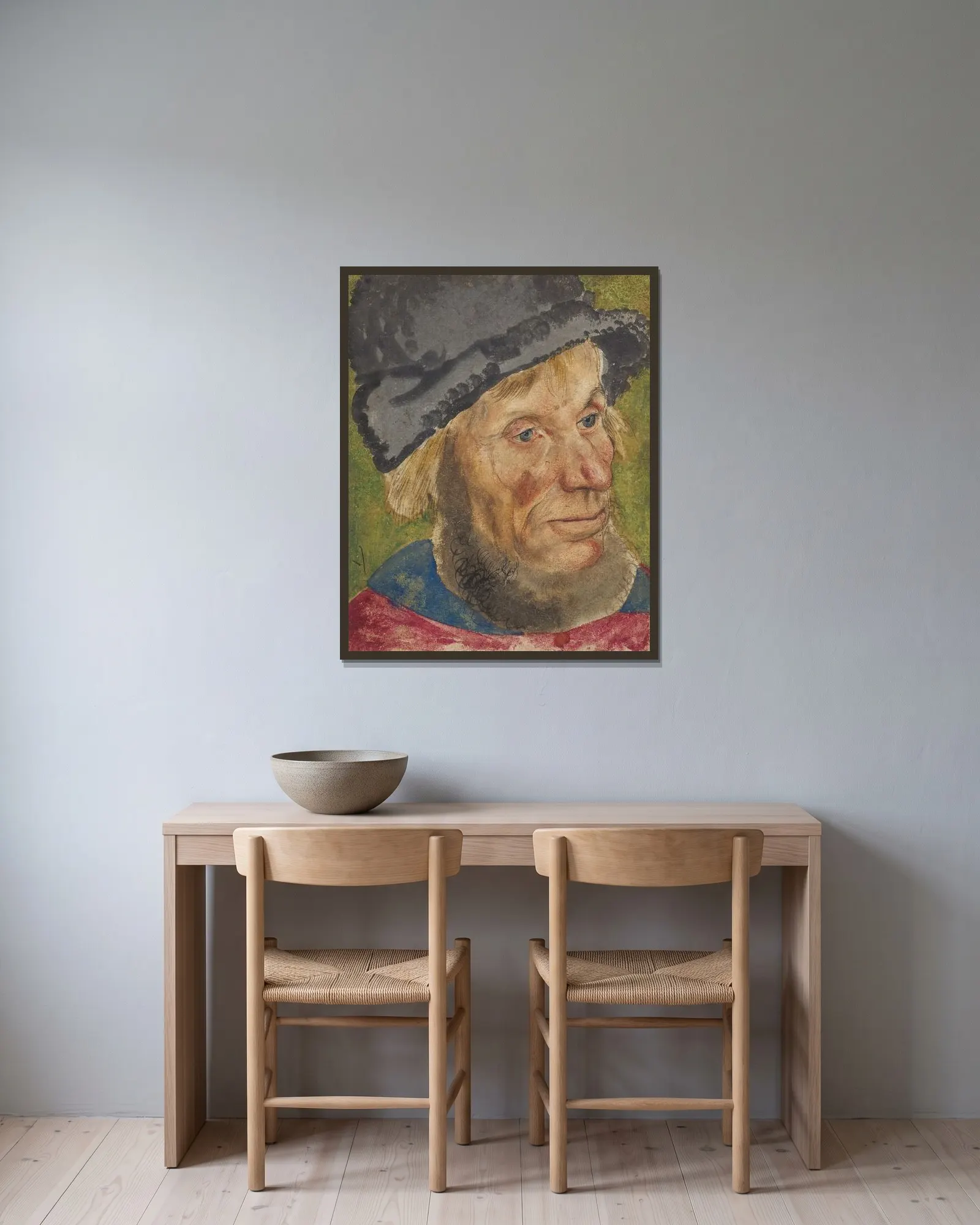 Head of a Peasant av Lucas Cranach the Elder inramad på en vägg
