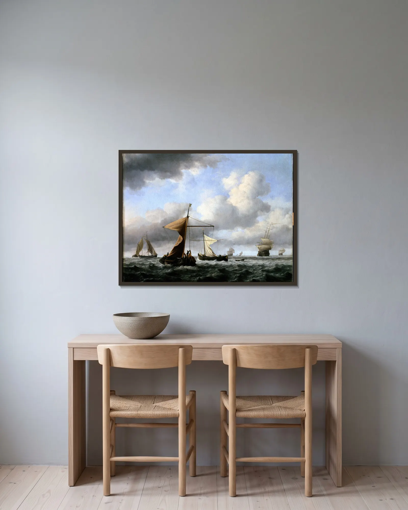 A Brisk Breeze av Willem van de Velde the Younger inramad på en vägg
