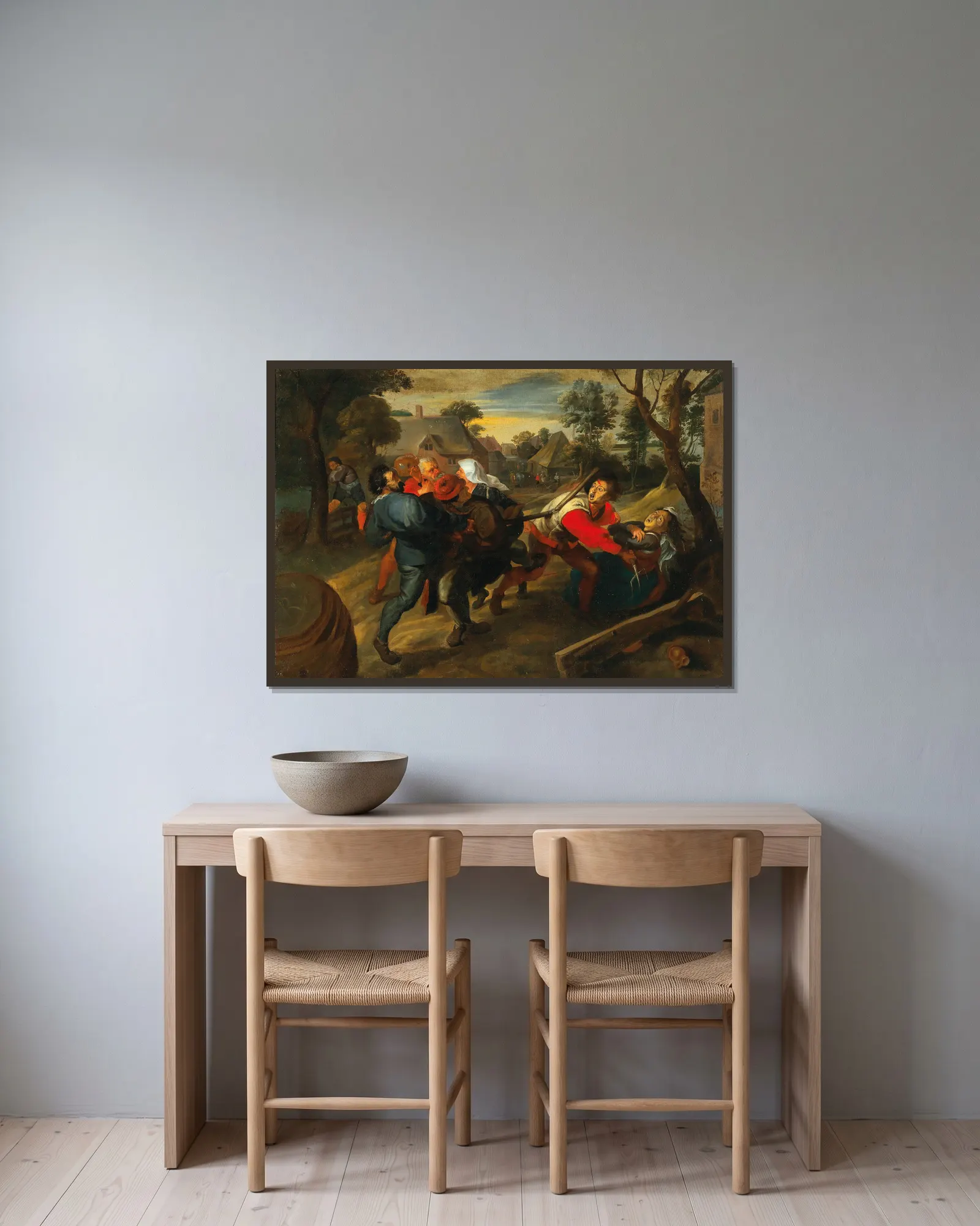 A Village Brawl av Jan Brueghel the Younger inramad på en vägg