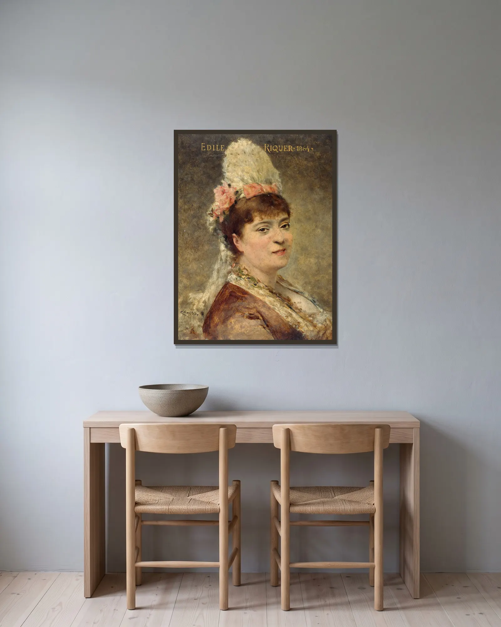 Portrait d’Édile Riquer av Théobald Chartran inramad på en vägg