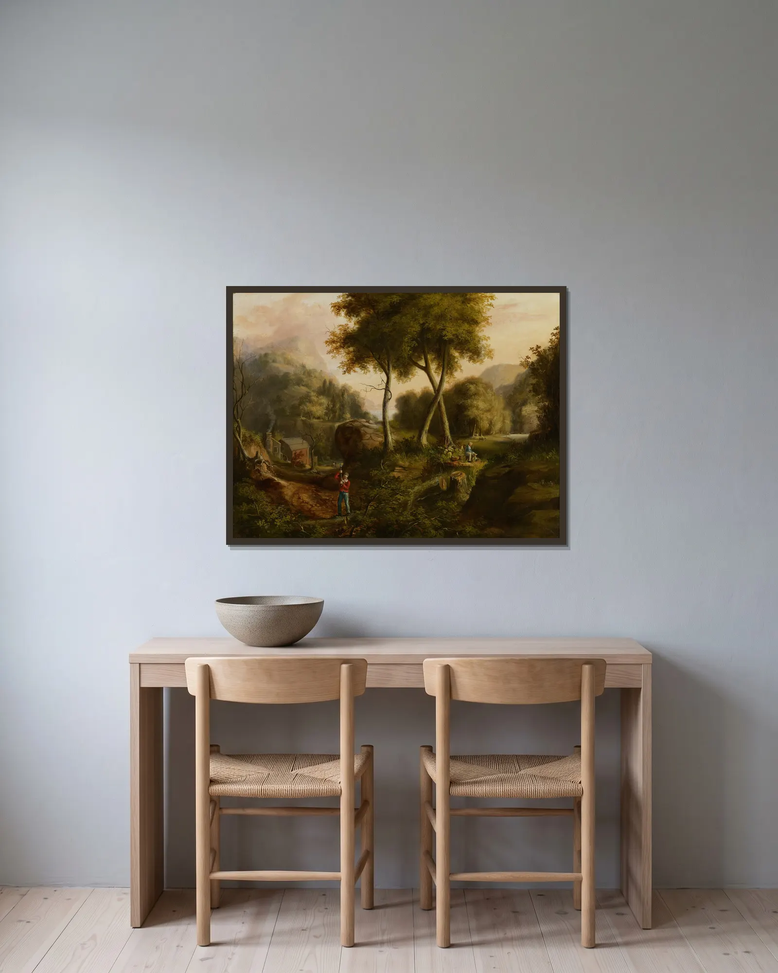 Landscape av Thomas Cole inramad på en vägg