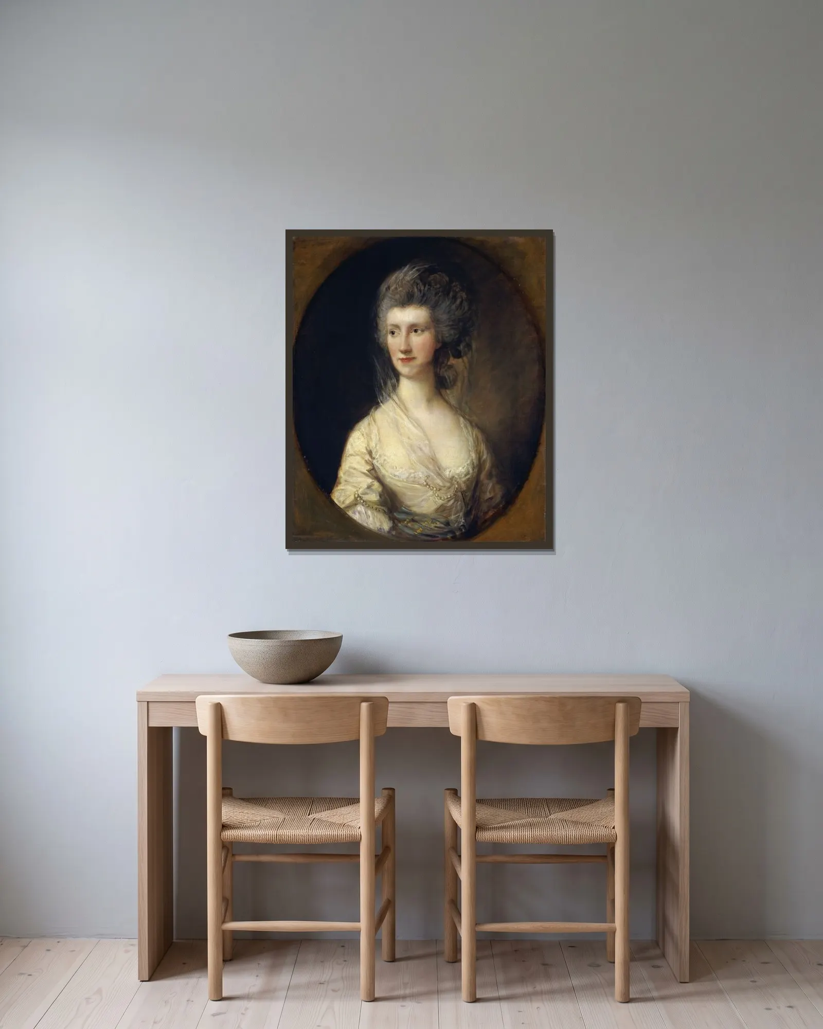 Mrs. John Taylor av Thomas Gainsborough inramad på en vägg