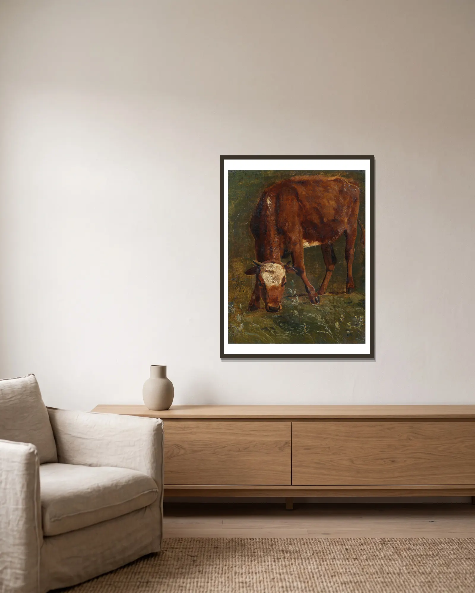 Grazing red heifer. Study av Johan Thomas Lundbye inramad på en vägg