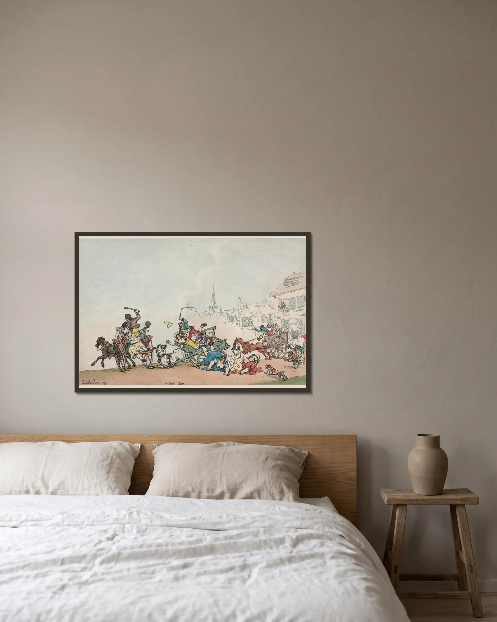 A Cart Race av Thomas Rowlandson inramad på en vägg