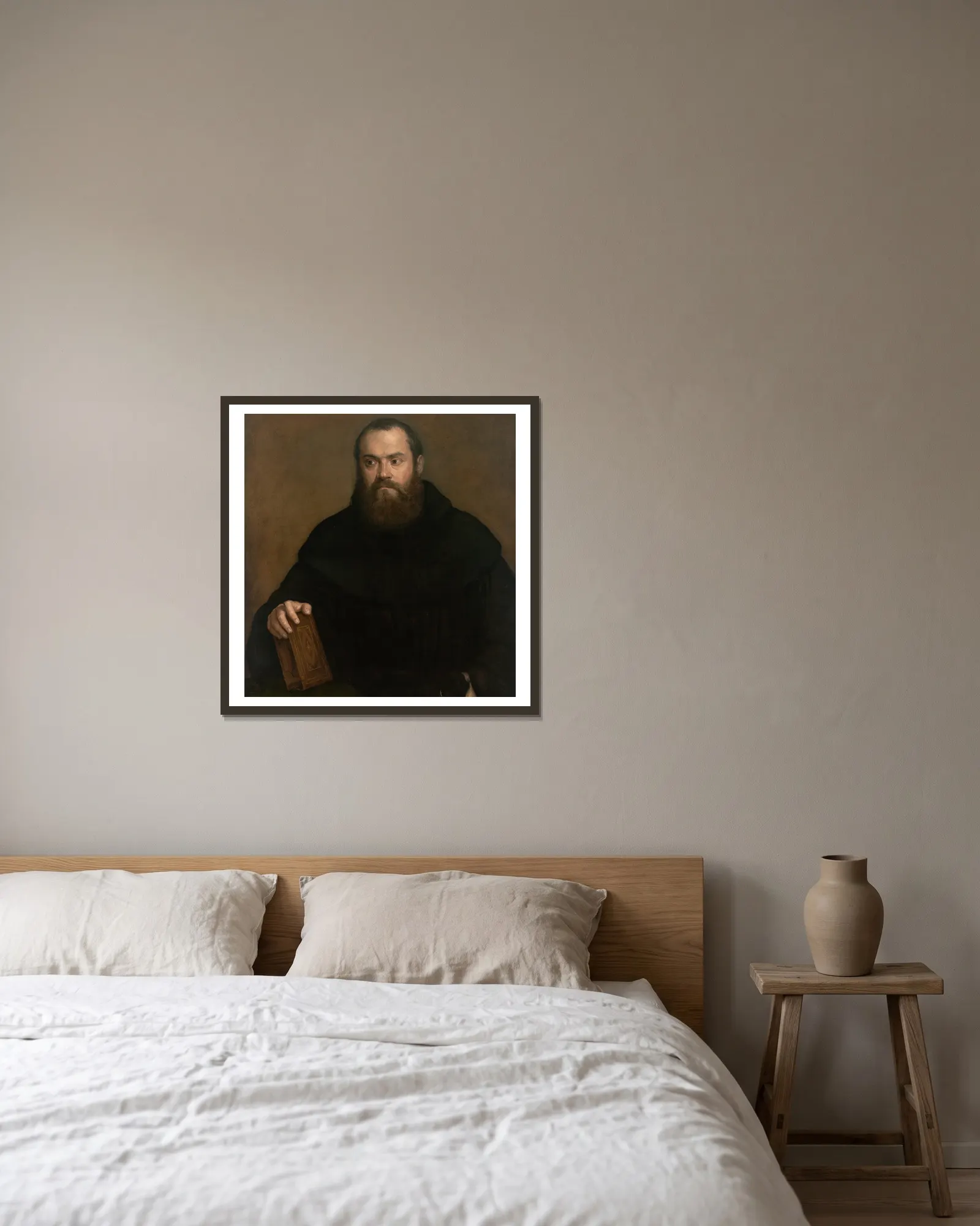 A monk with a book av Titian inramad på en vägg