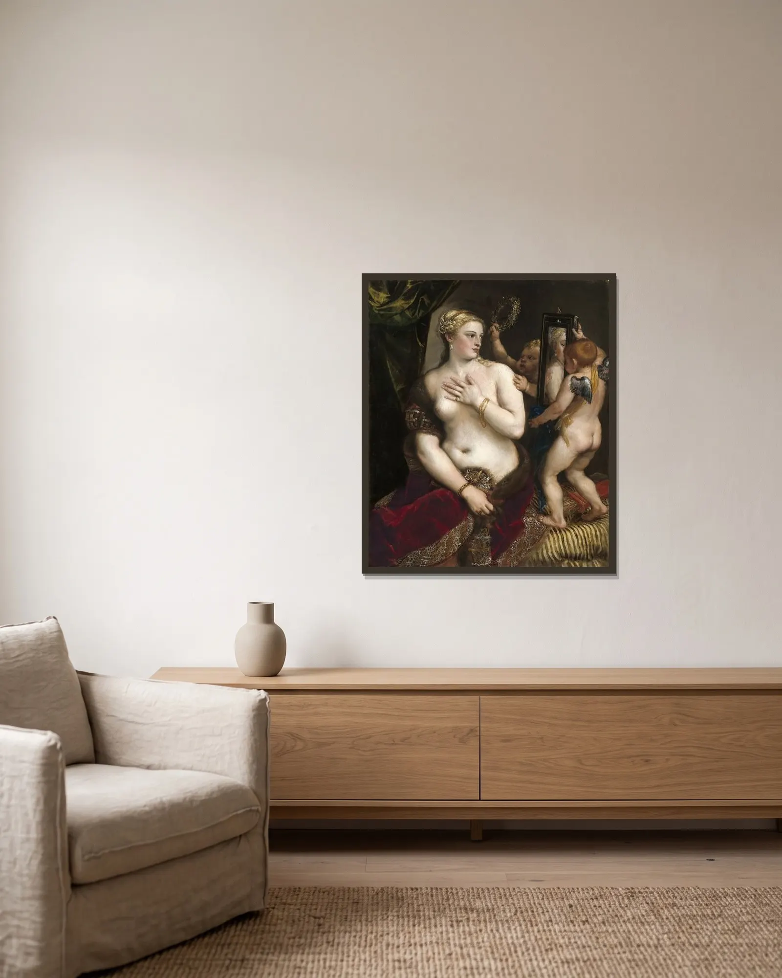 Venus With a Mirror av Titian inramad på en vägg