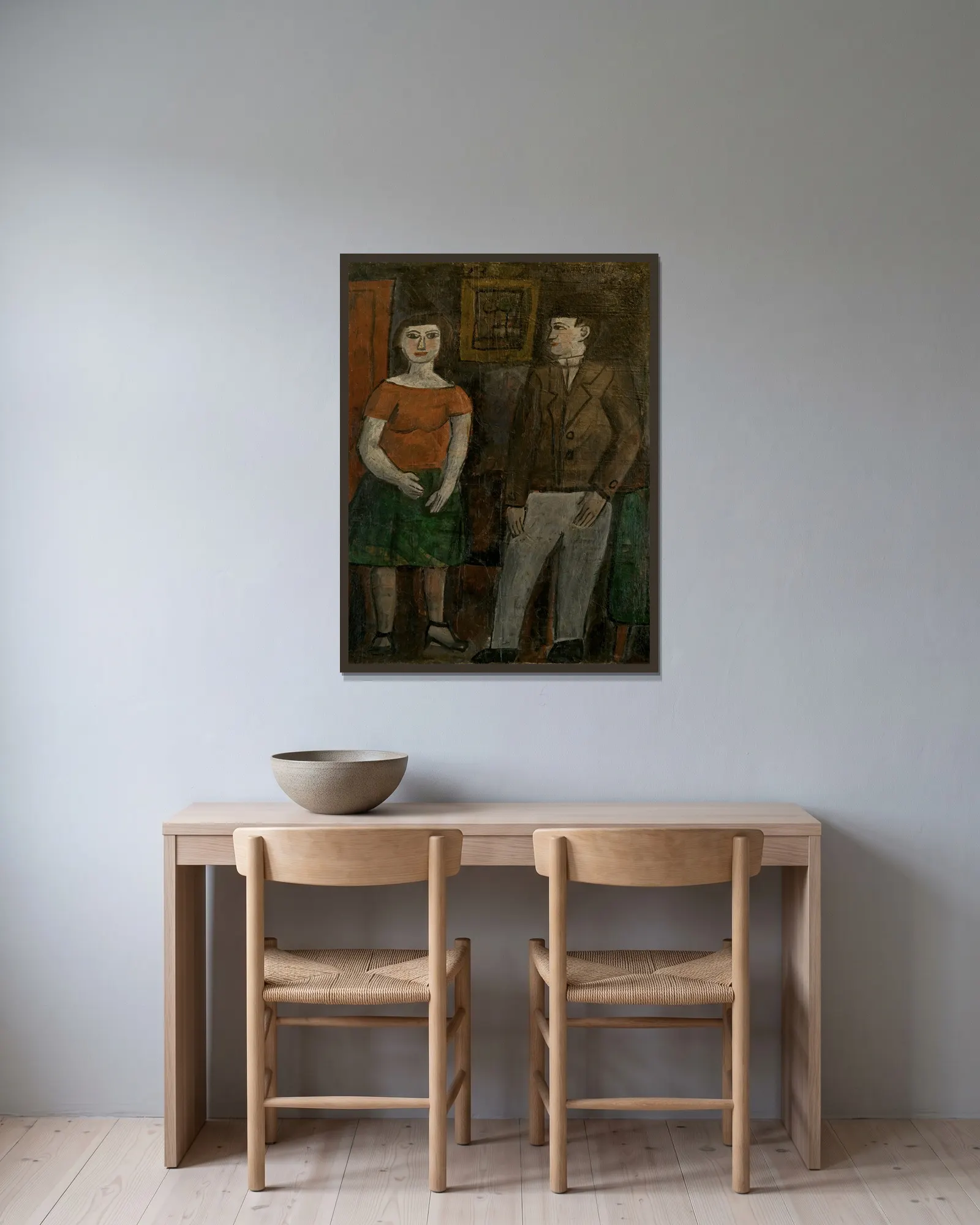 Figuras av Joaquín Torres-García inramad på en vägg