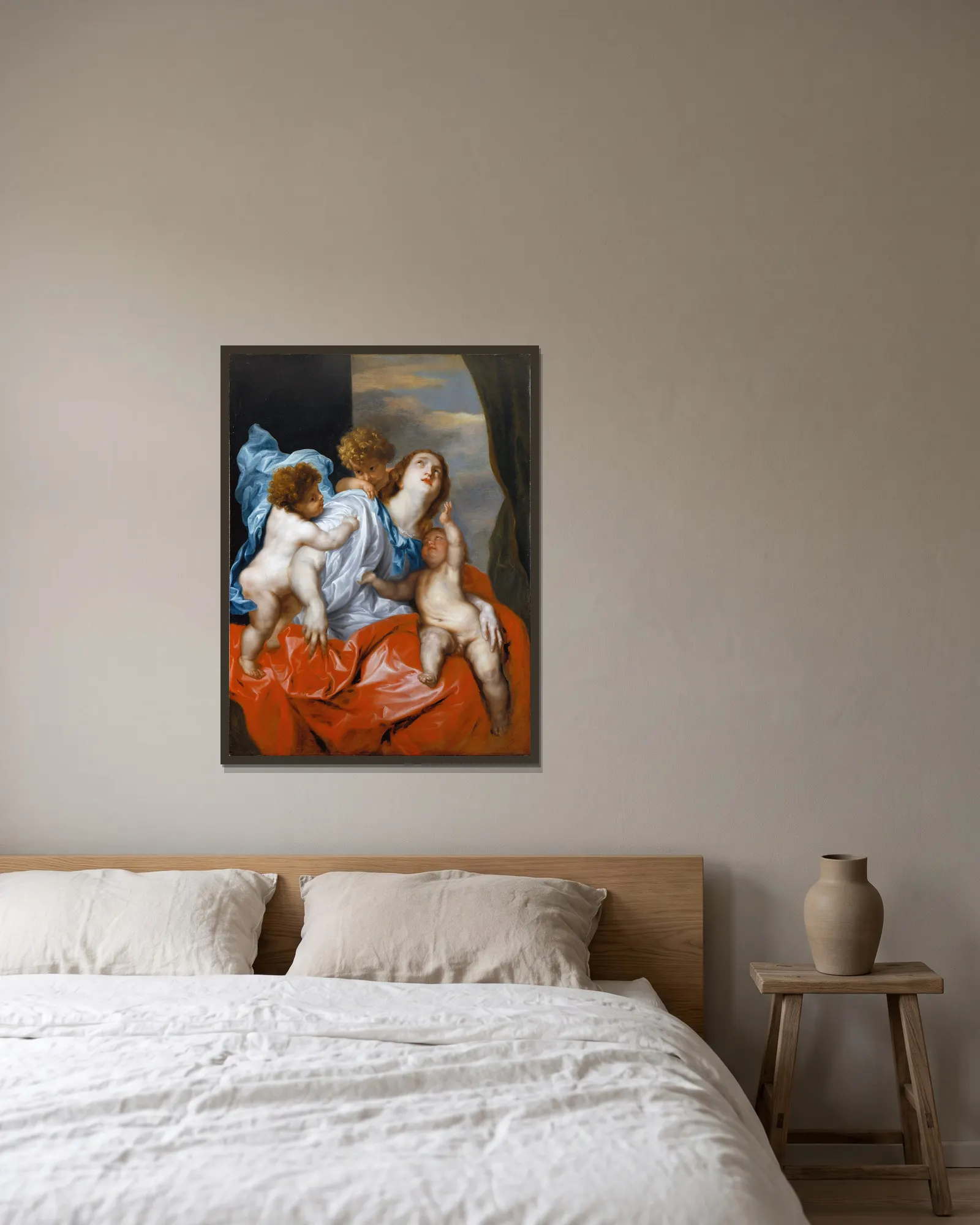 Charity av Anthony van Dyck inramad på en vägg