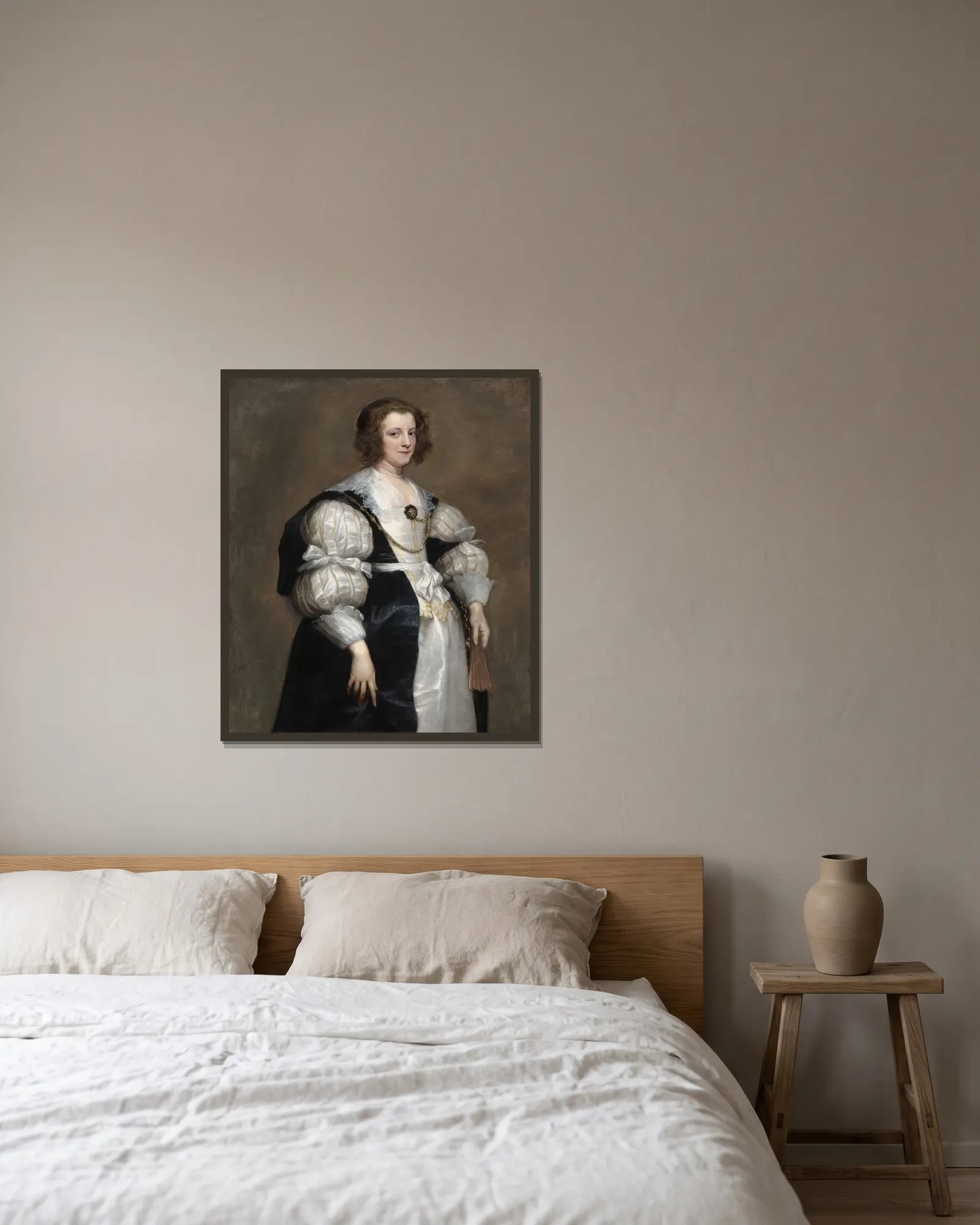 Lady with a Fan av Anthony van Dyck inramad på en vägg