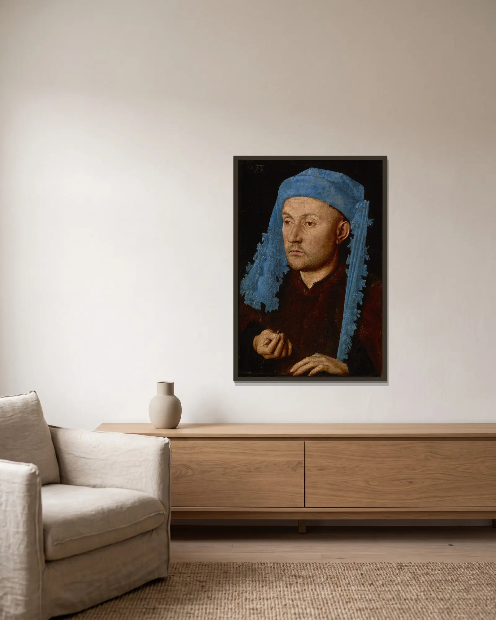 Man in a Blue Cap av Jan van Eyck inramad på en vägg
