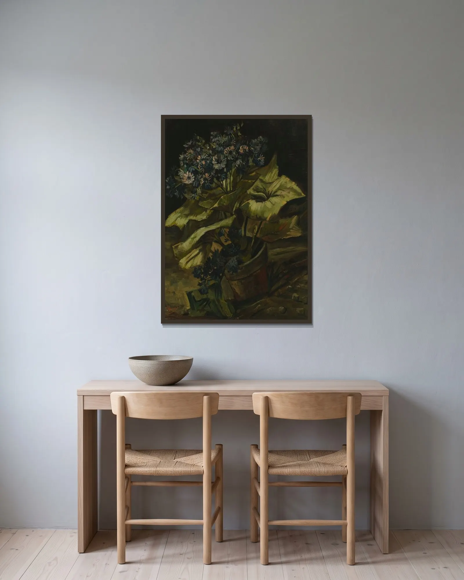 Cineraria av Vincent van Gogh inramad på en vägg