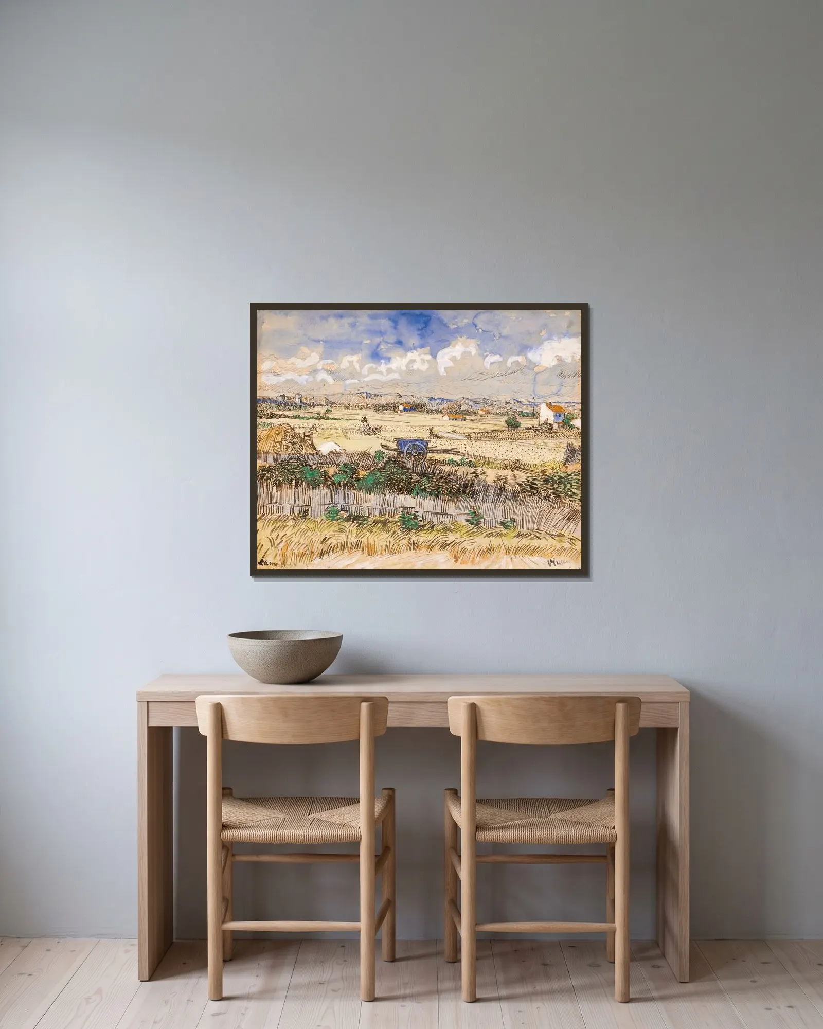 La Moisson en Provence av Vincent van Gogh inramad på en vägg