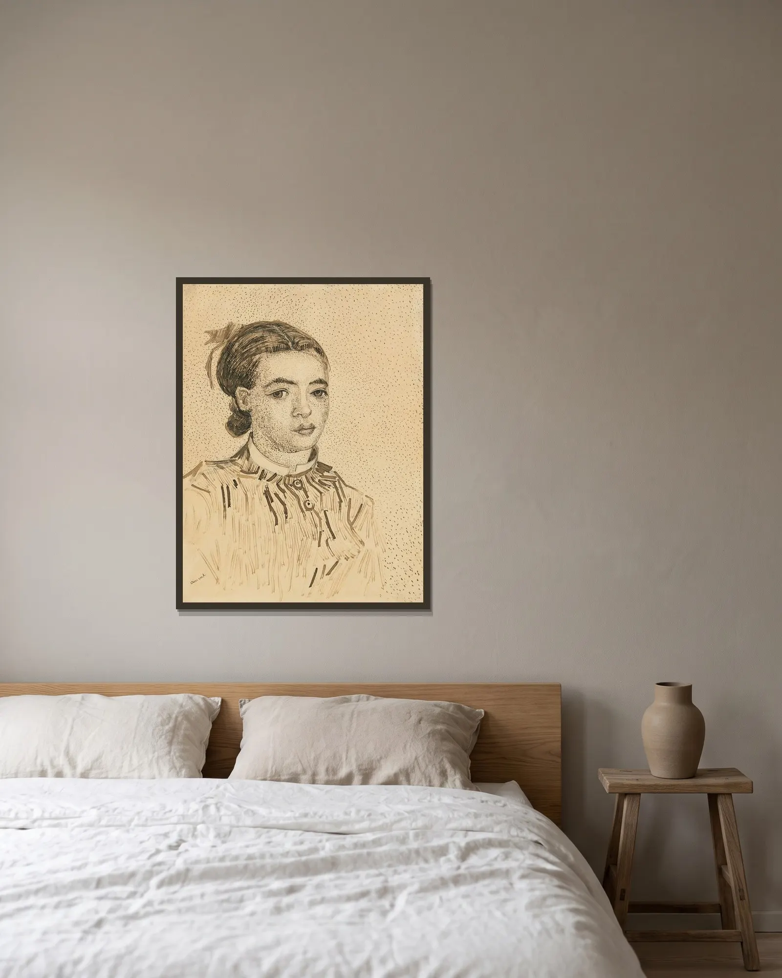La Mousmé av Vincent van Gogh inramad på en vägg
