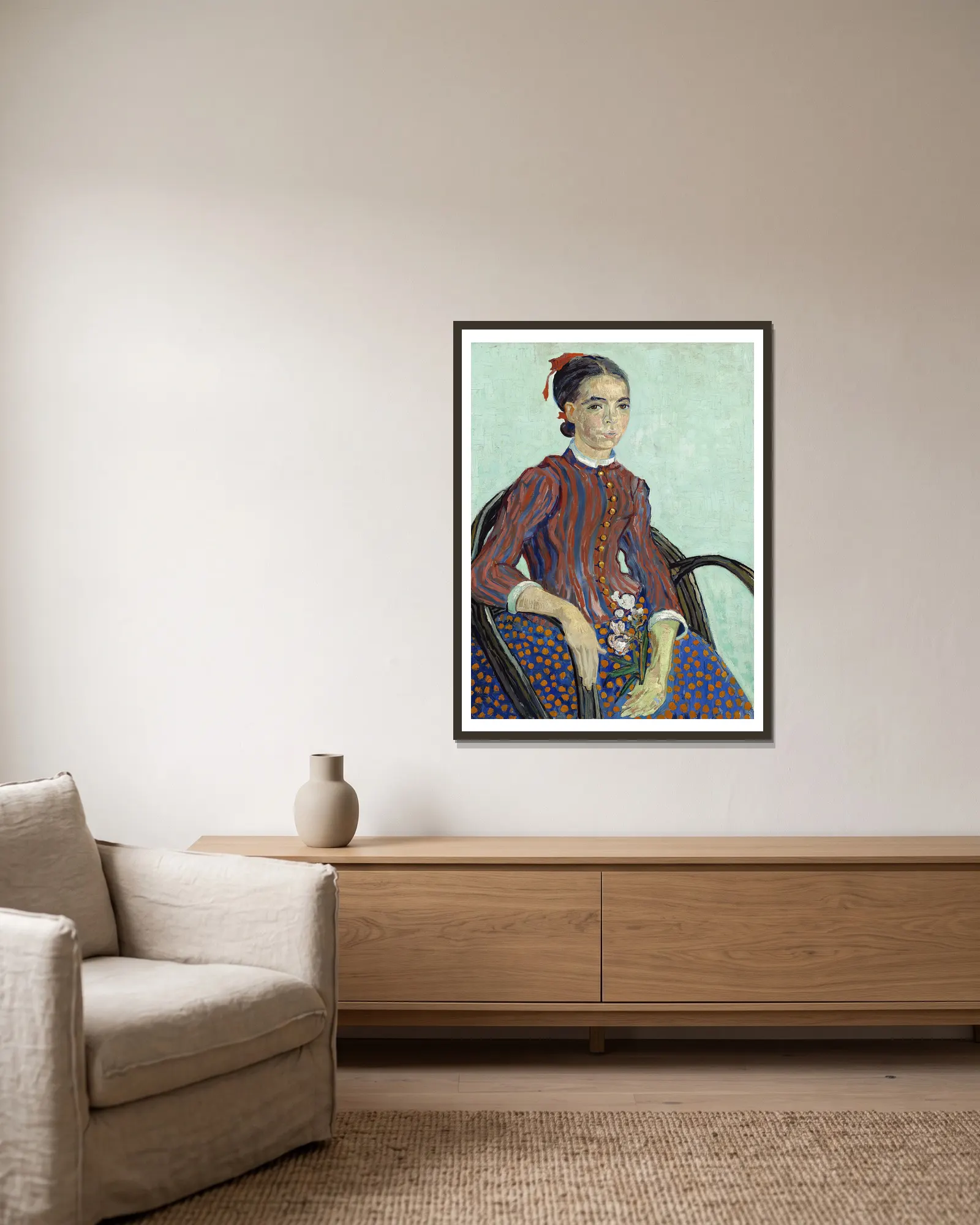 La Mousmé av Vincent van Gogh inramad på en vägg