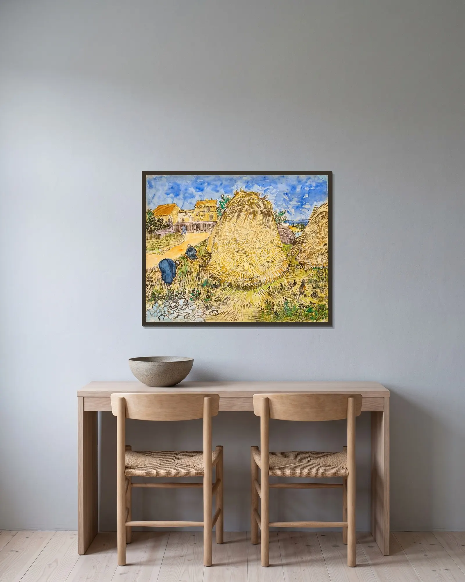 Meules de blé av Vincent van Gogh inramad på en vägg