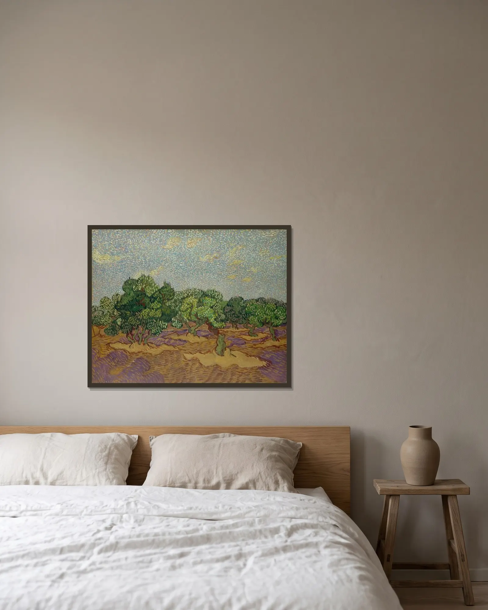 Olive Trees av Vincent van Gogh inramad på en vägg