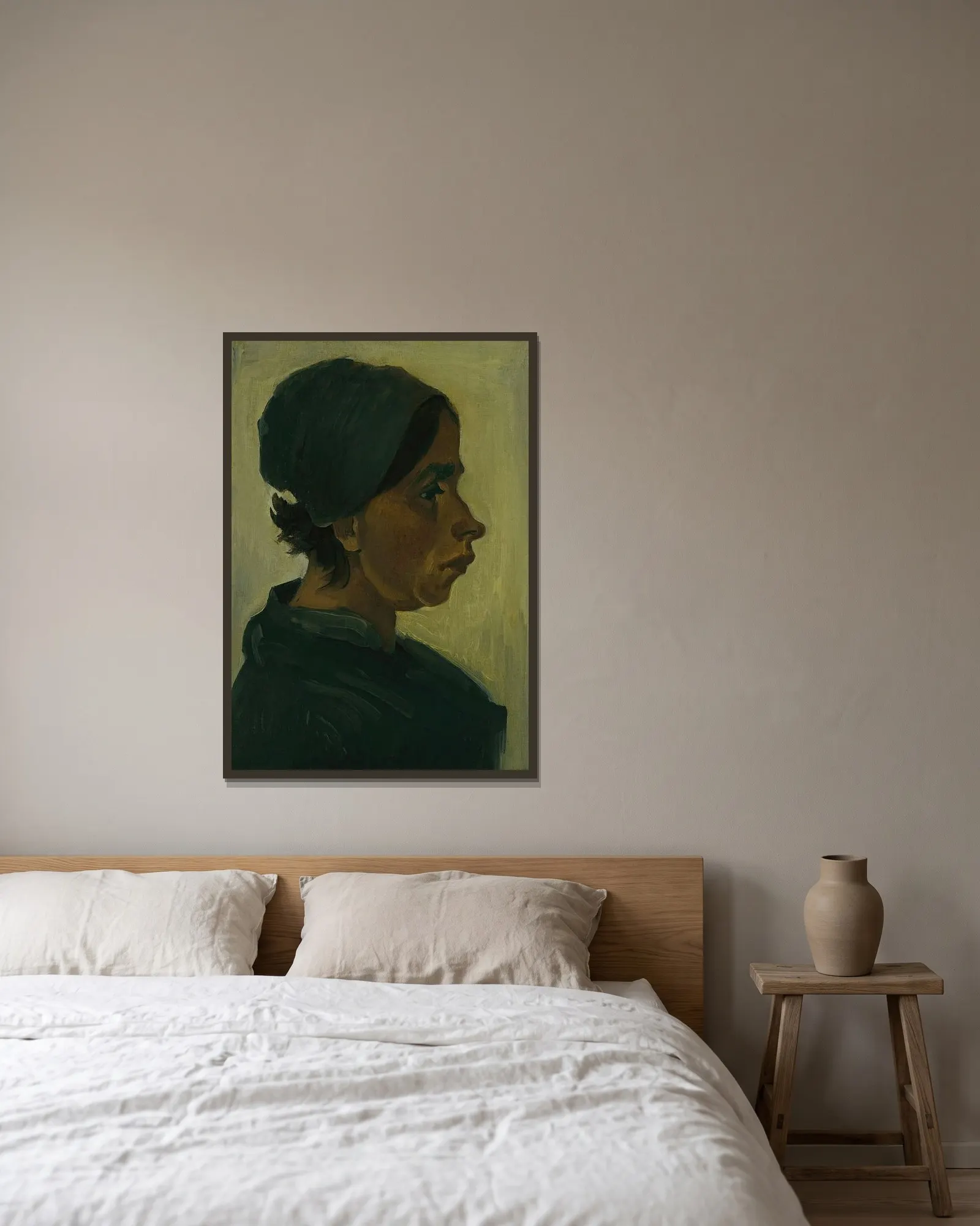 Peasant woman, head av Vincent van Gogh inramad på en vägg
