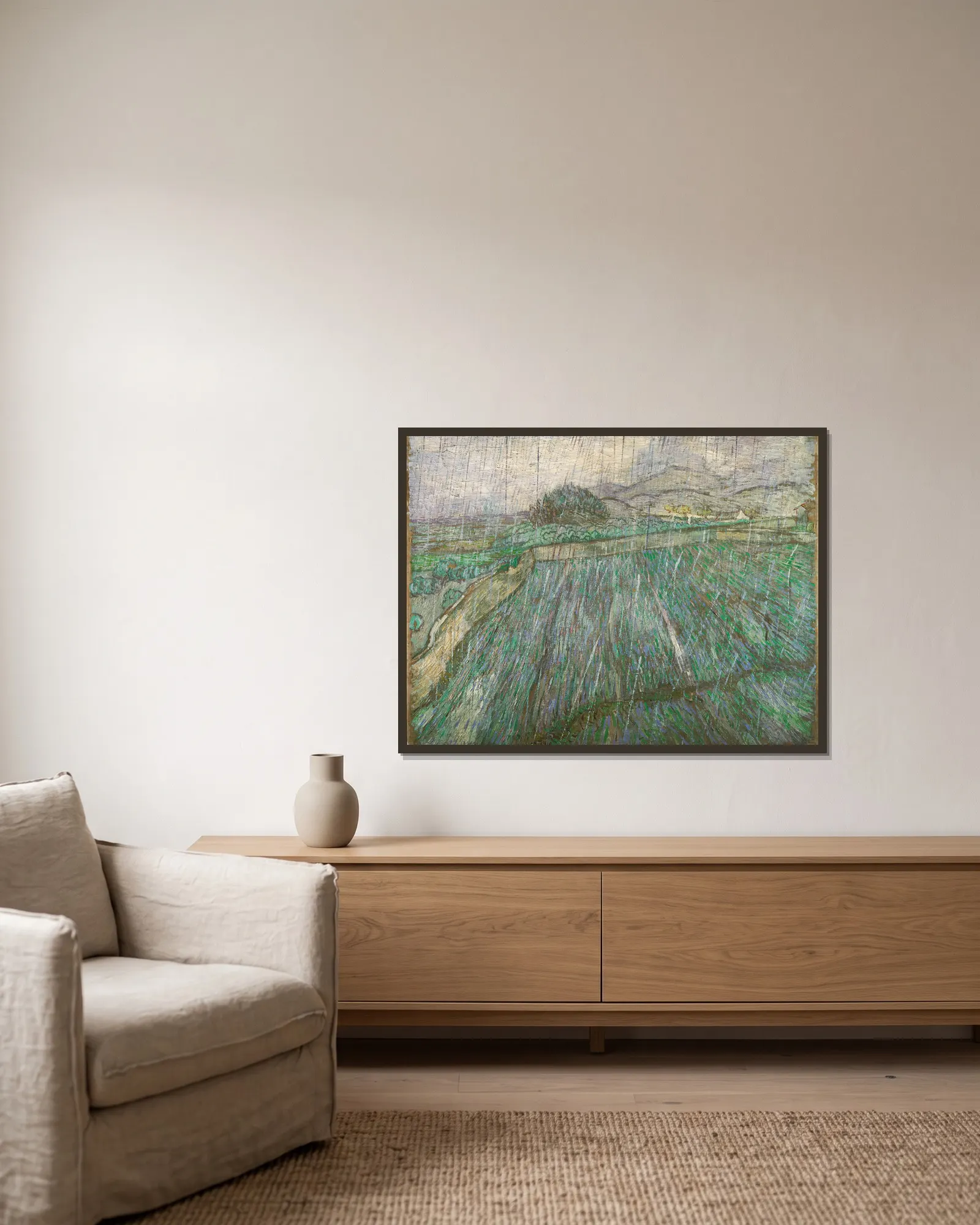 Rain av Vincent van Gogh inramad på en vägg