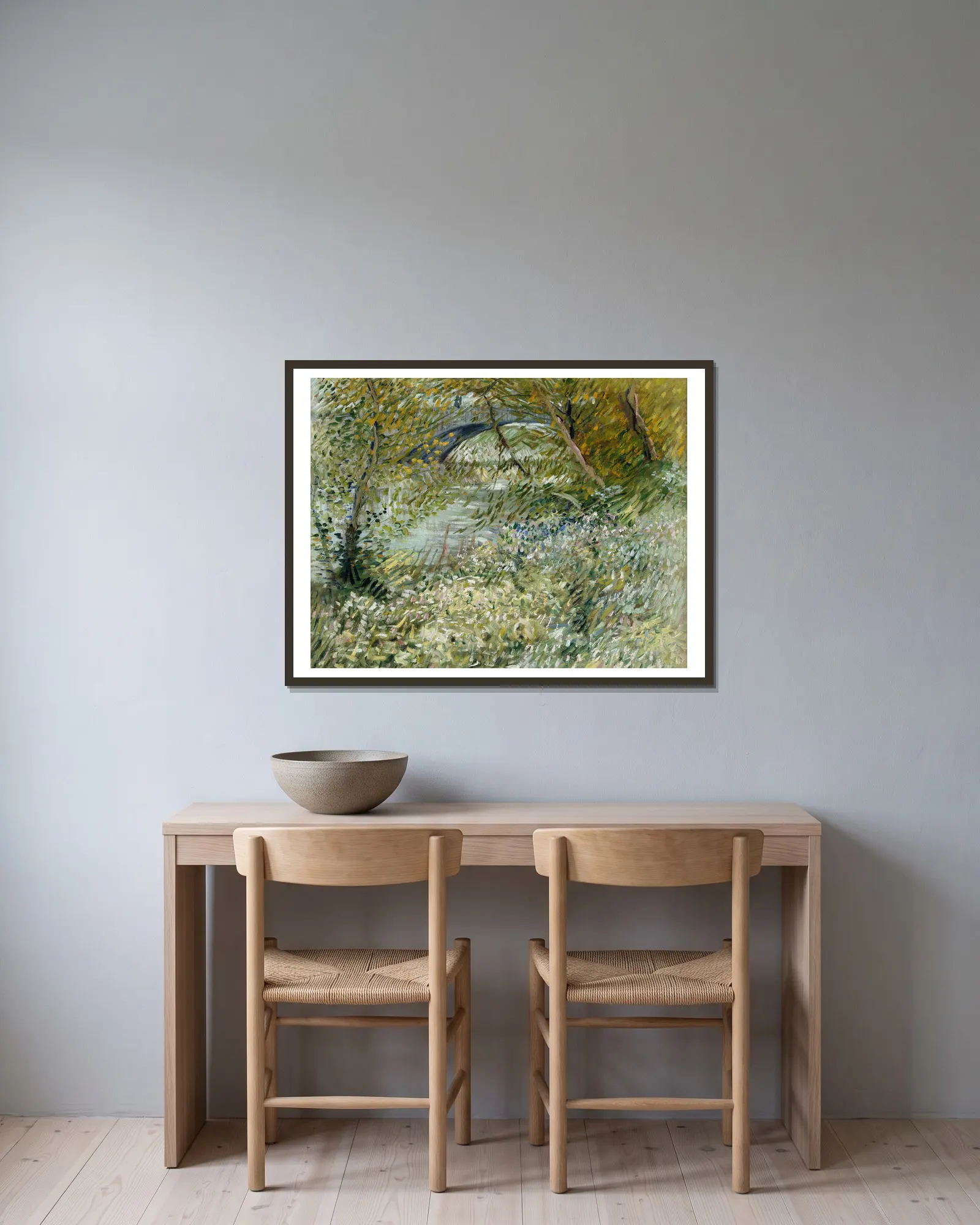 River Bank in Springtime av Vincent van Gogh inramad på en vägg
