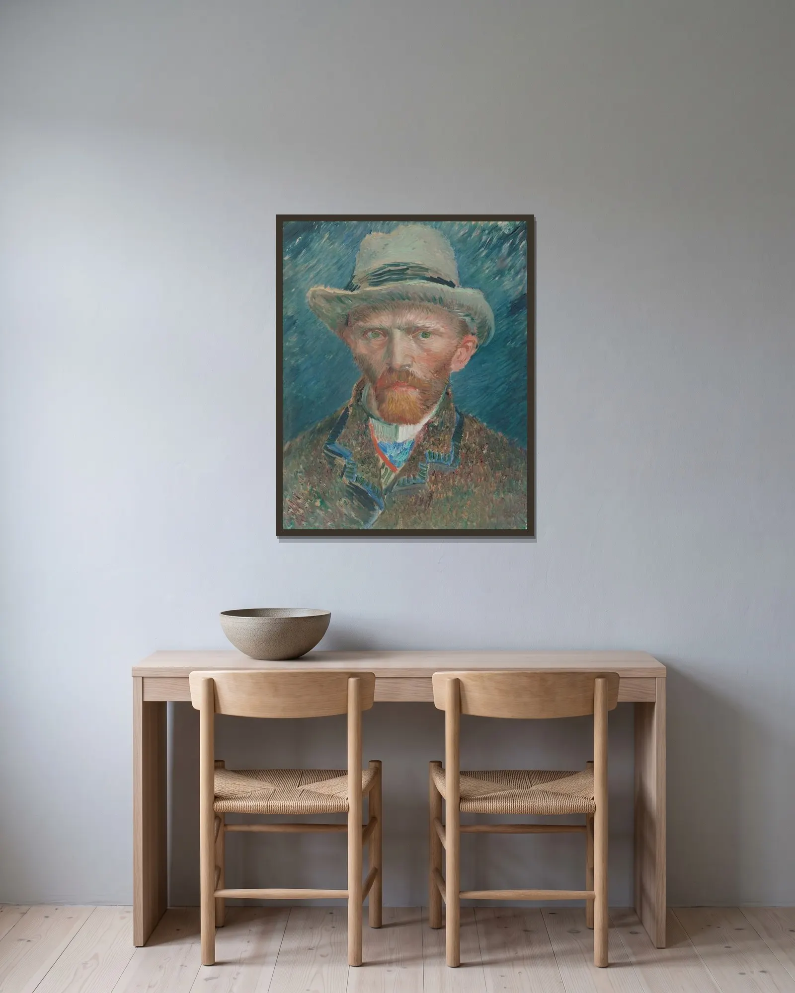Self-portrait av Vincent van Gogh inramad på en vägg
