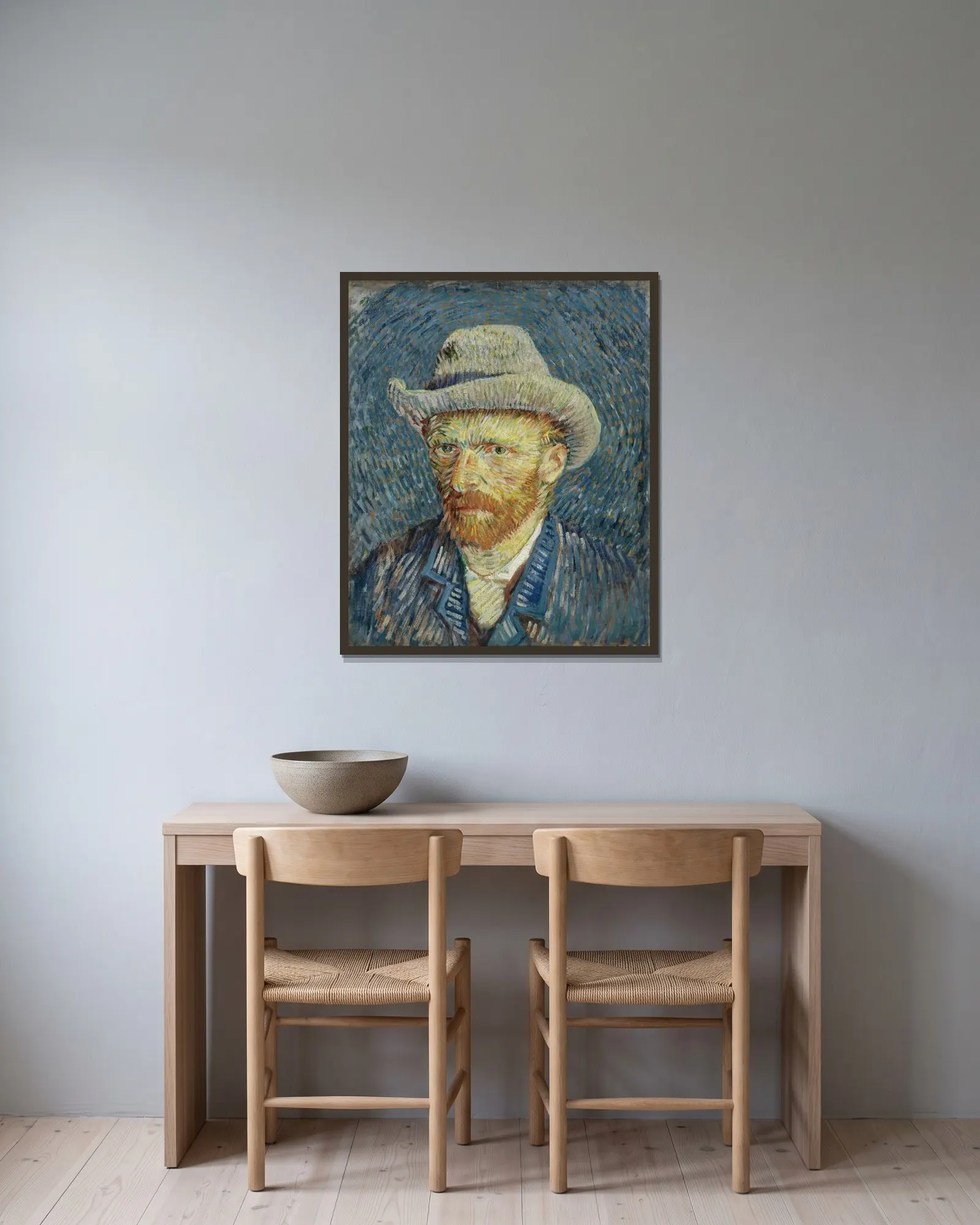 Self-portrait with grey felt hat av Vincent van Gogh inramad på en vägg