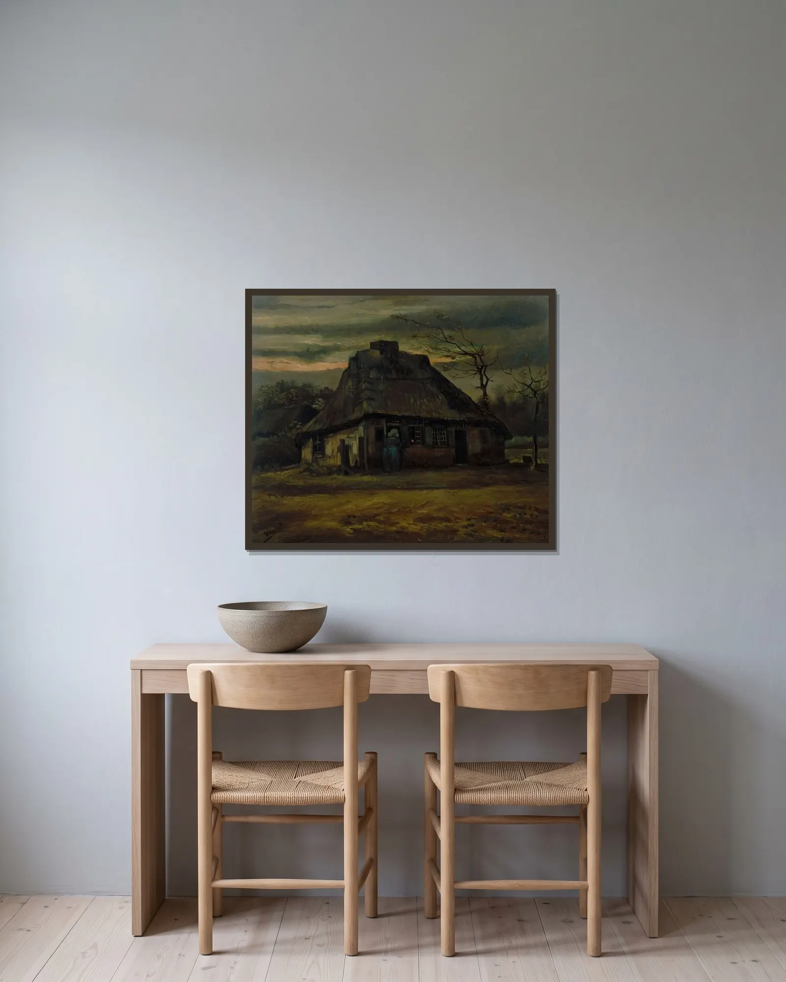 The cottage av Vincent van Gogh inramad på en vägg